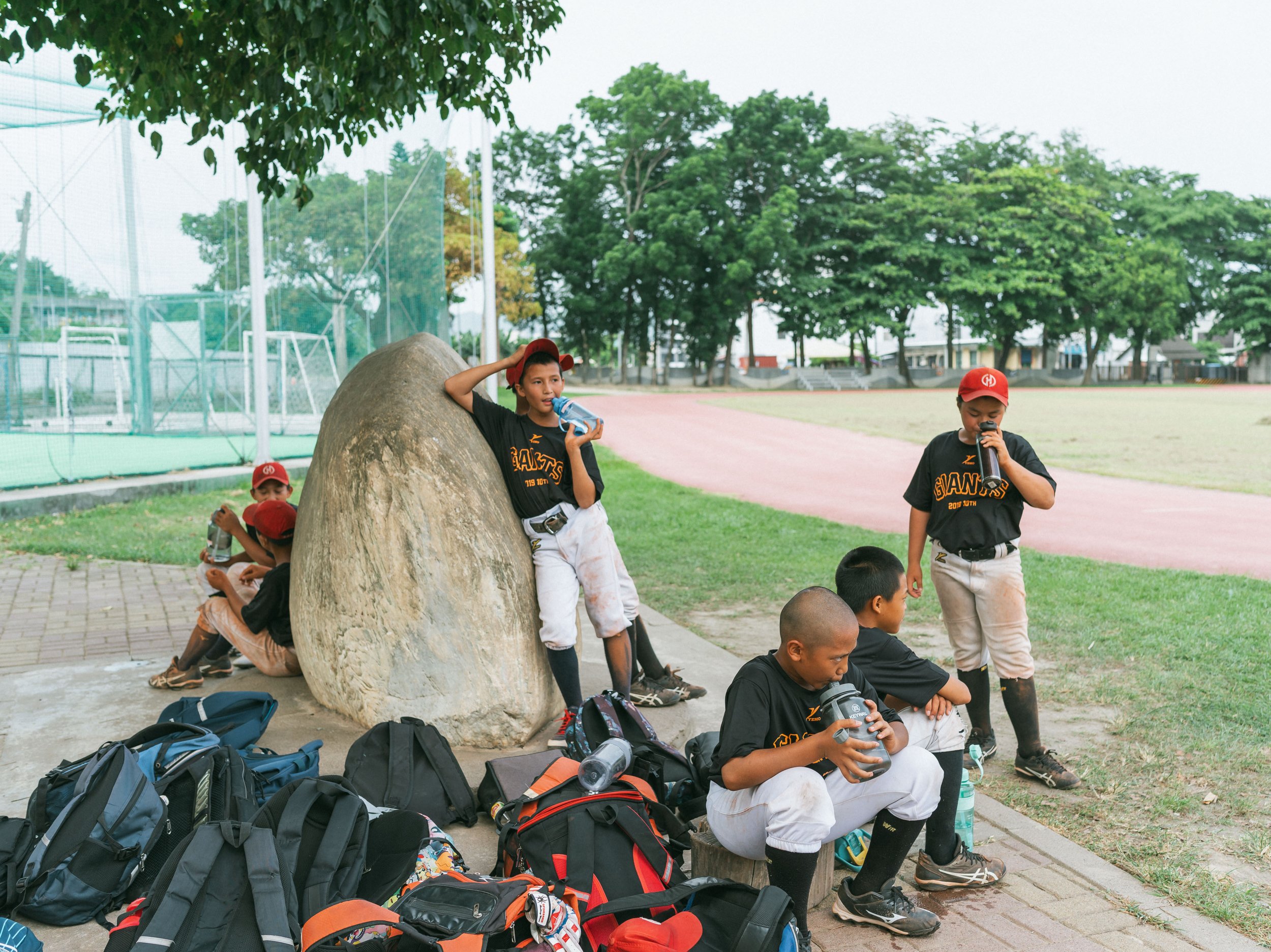 Children from Team A of Bei-Nan Elementary School rest after training in the afternoon.