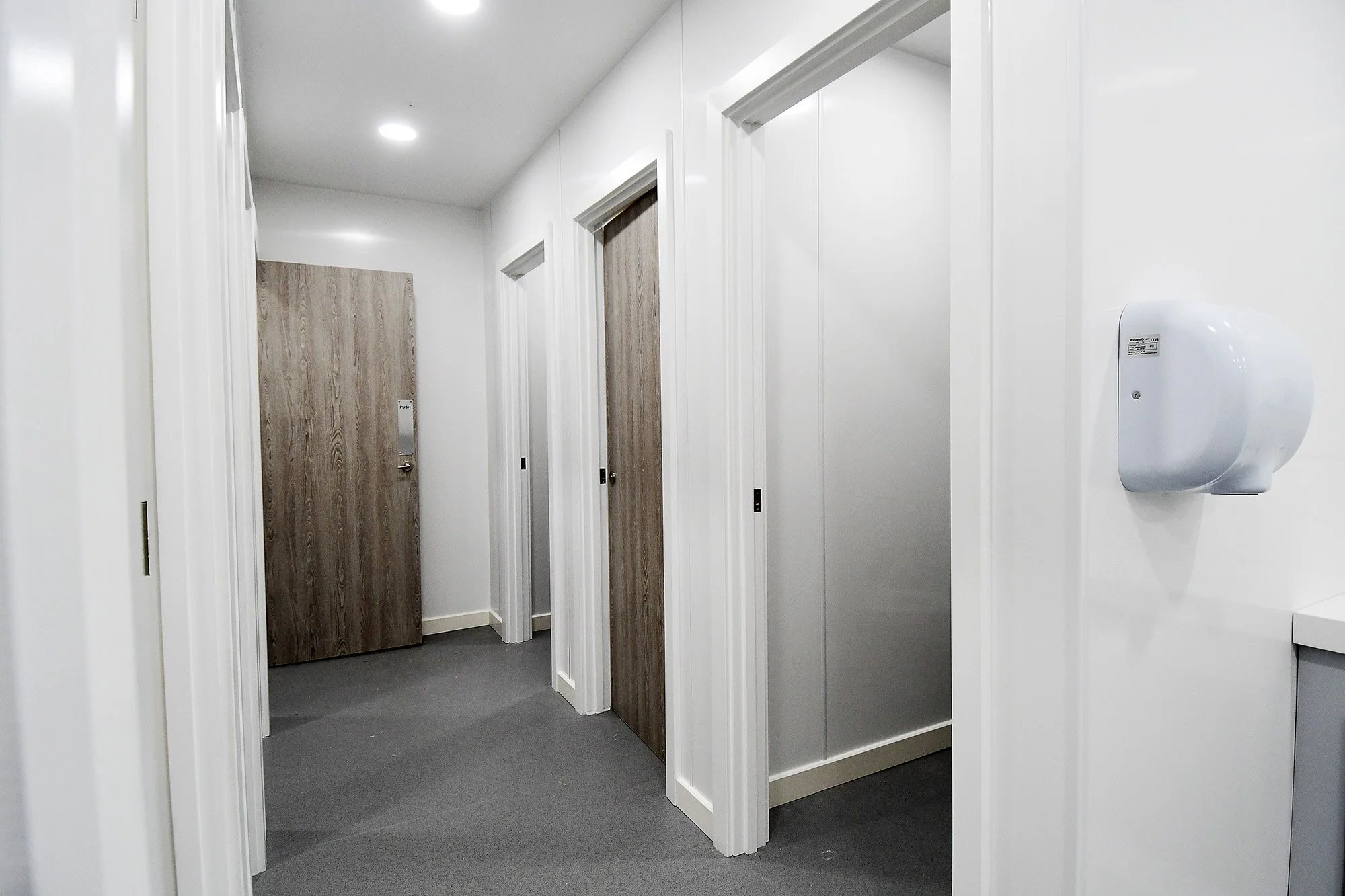unisex-school-washroom-corridor-private-wc-doors.jpg