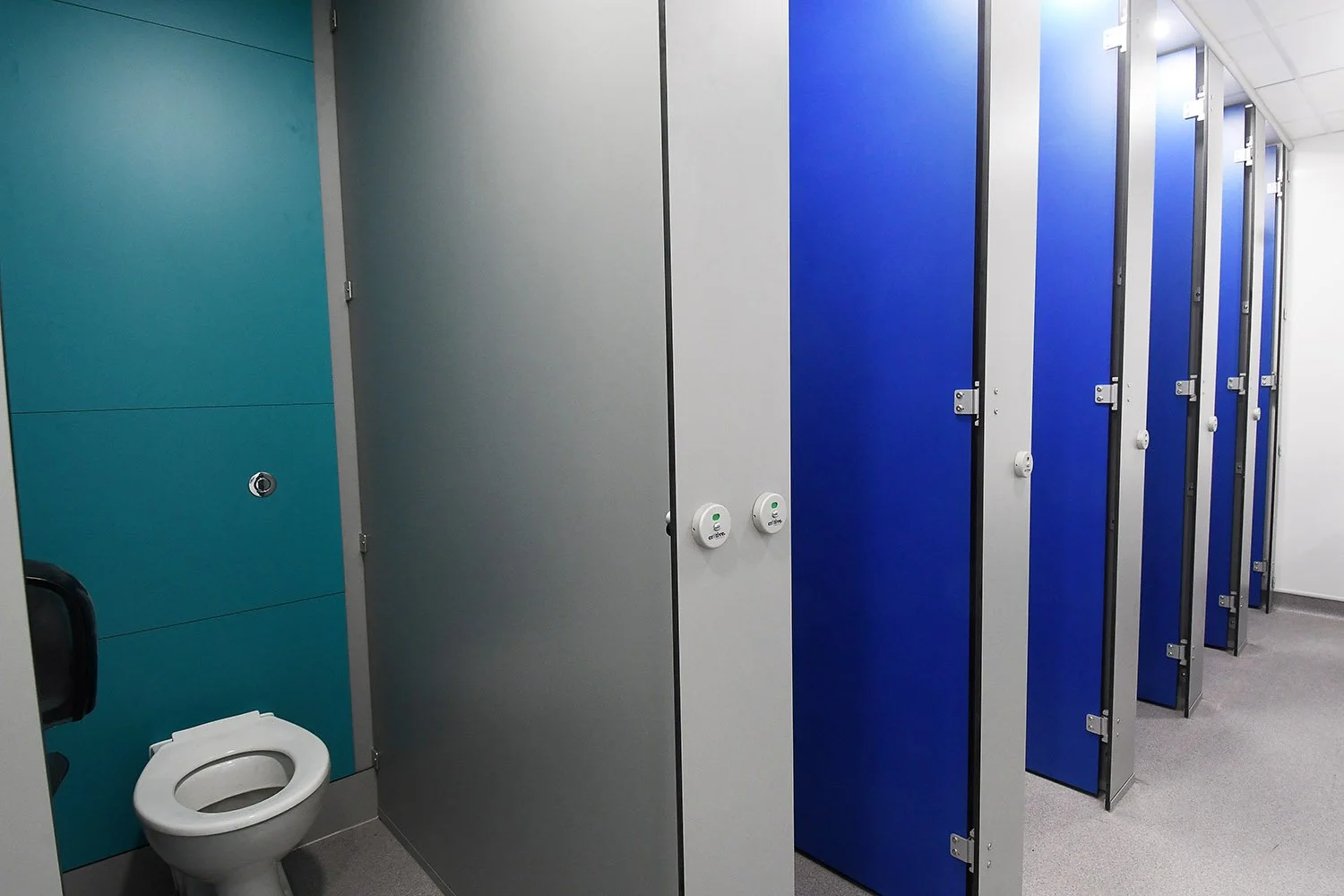school-unisex-toilet-cubicles-blue-colour-zoning-cr8tive-washrooms.jpg