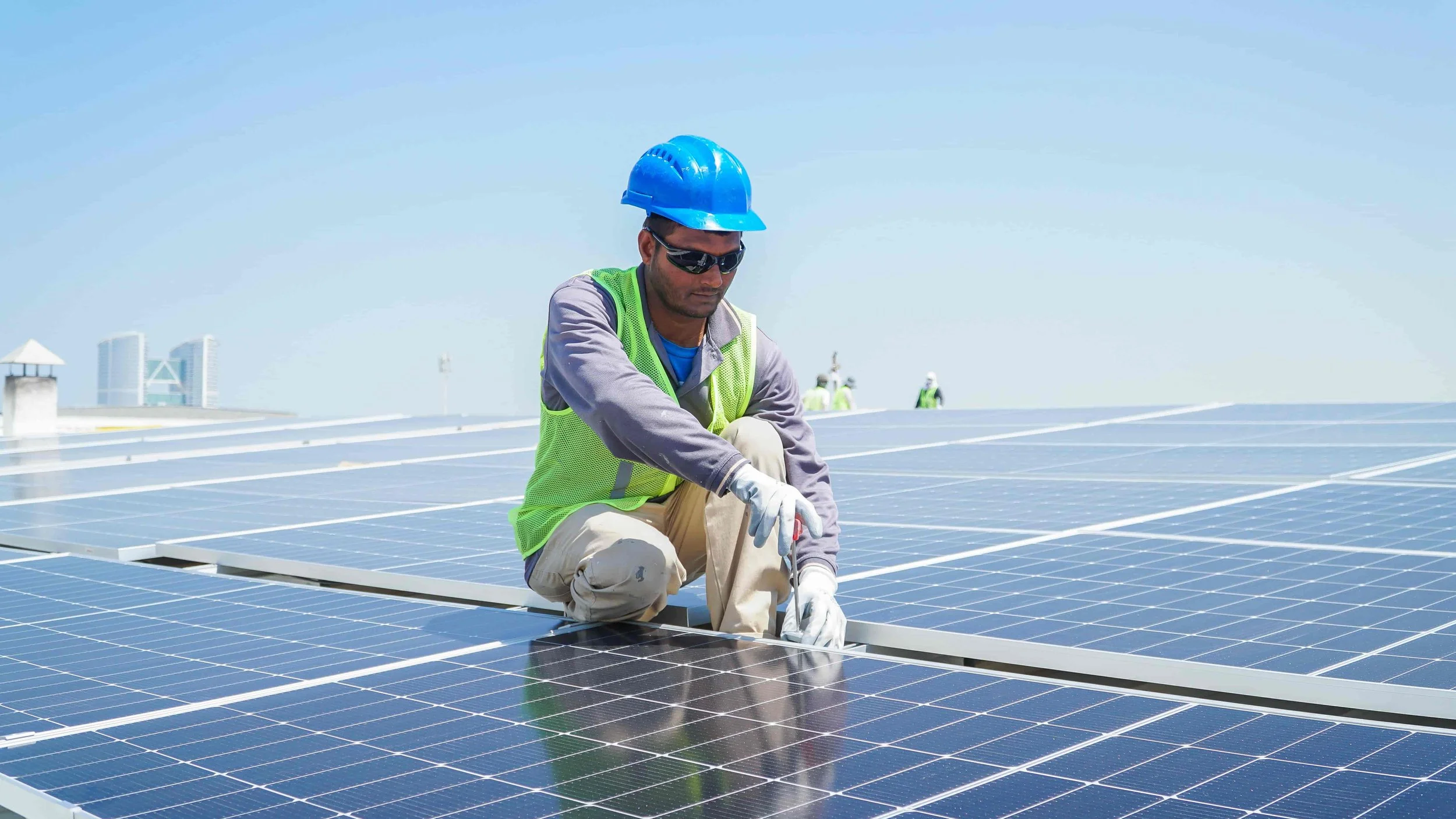 Solar Panel Clamping by Worker.jpg