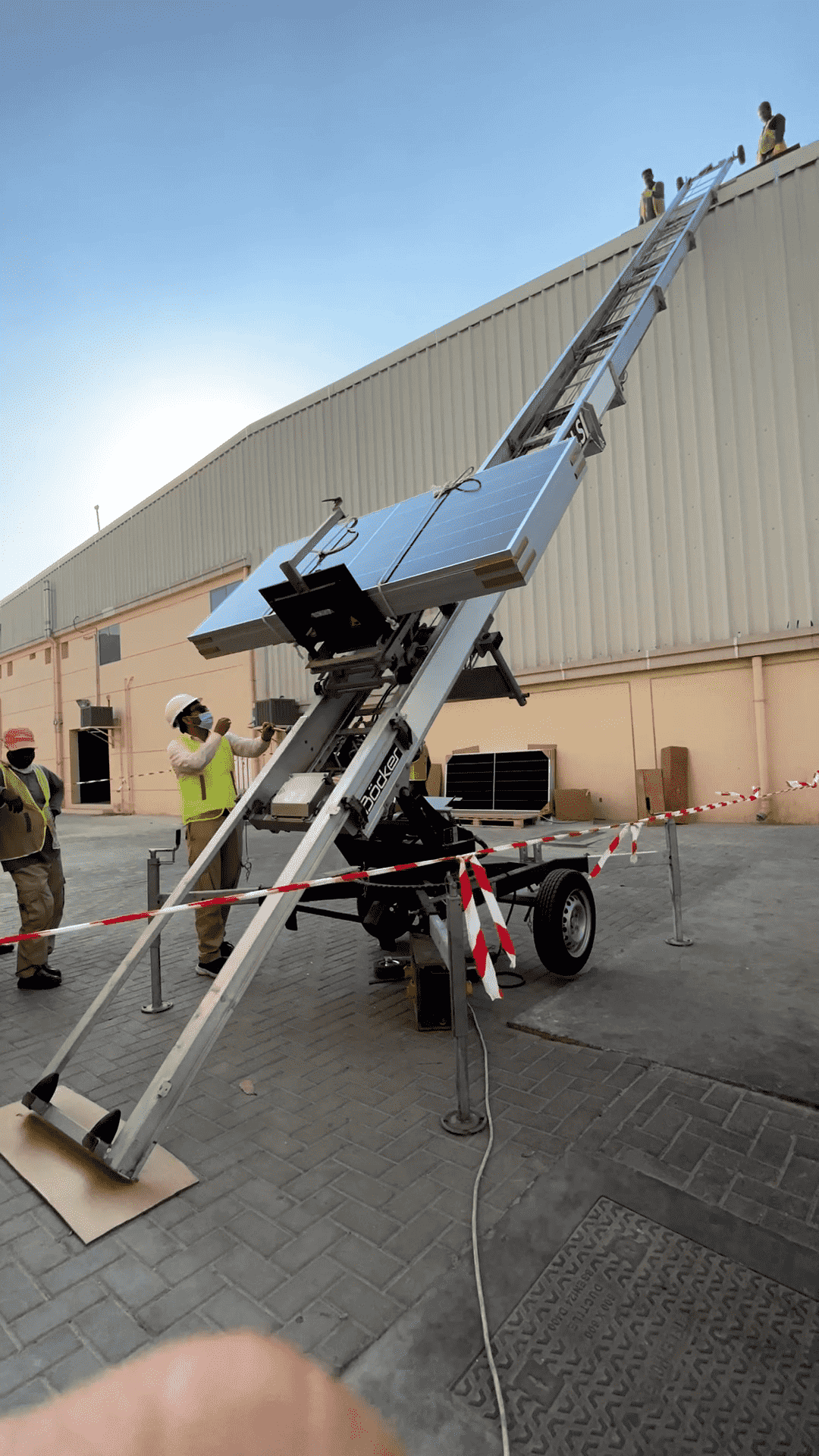 Lifting Solar Panels to Roof.png