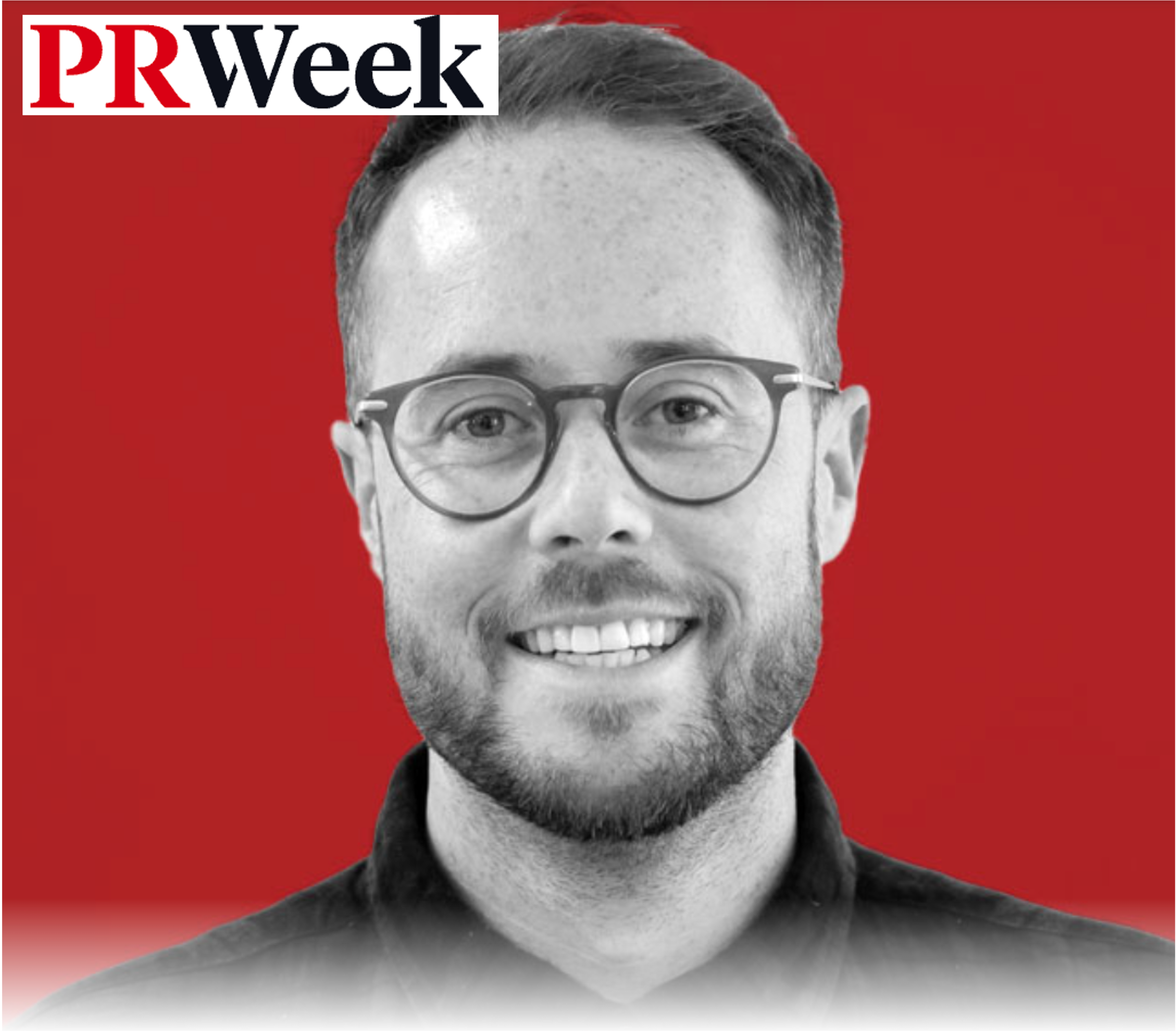 Black-and-white portrait of a smiling man with glasses and a beard, set against a red background, with the PR Week logo in the top left corner.