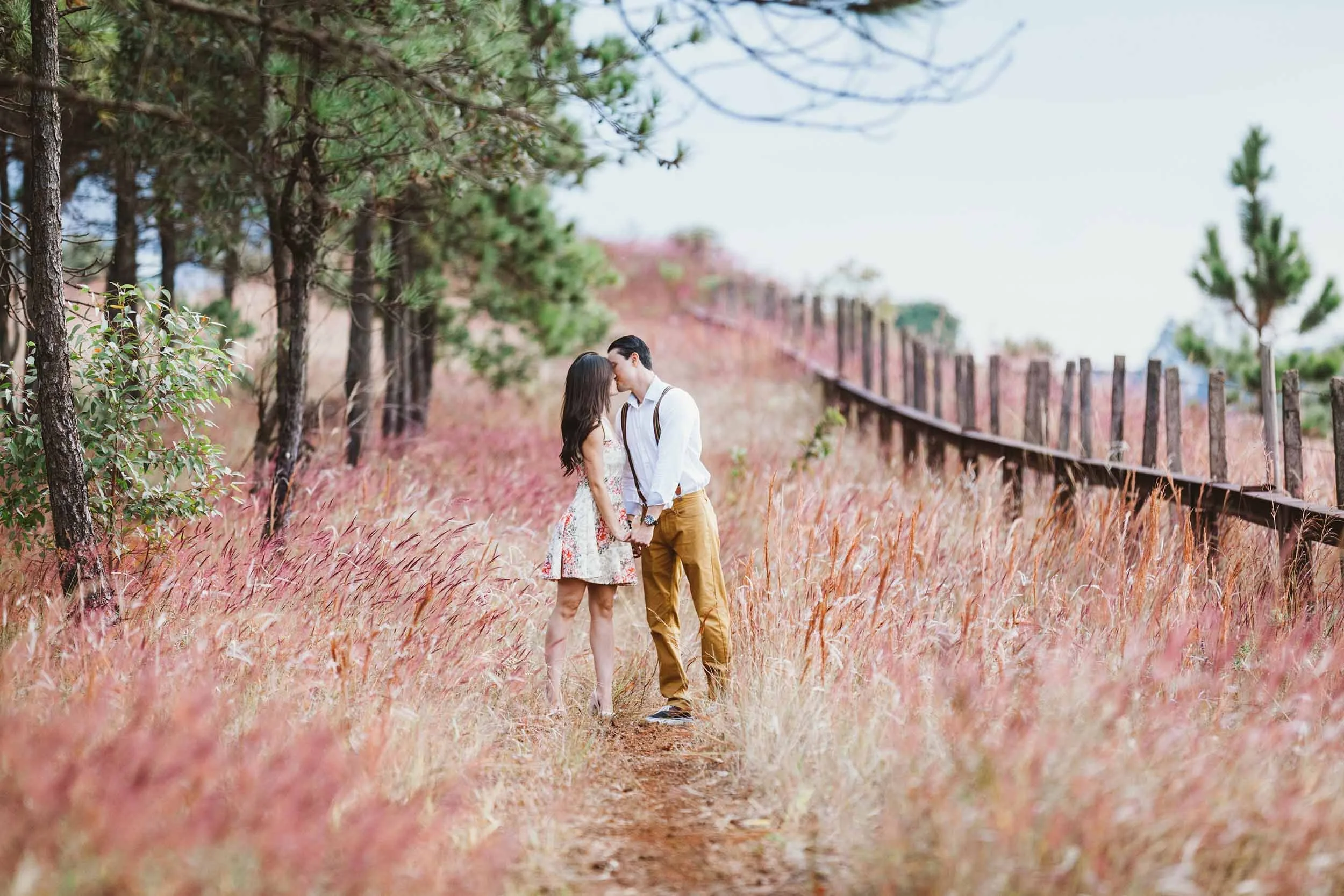 A young engaged couple in love and kissing
