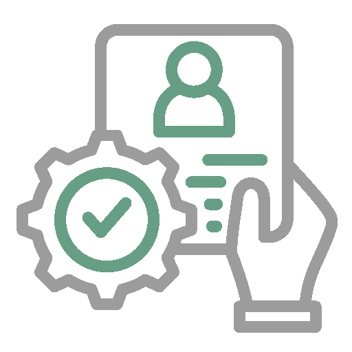 A person in a gray hat and black jacket standing in front of a large orange maple tree with a serene expression, holding a camera. The ground is covered with fallen autumn leaves.