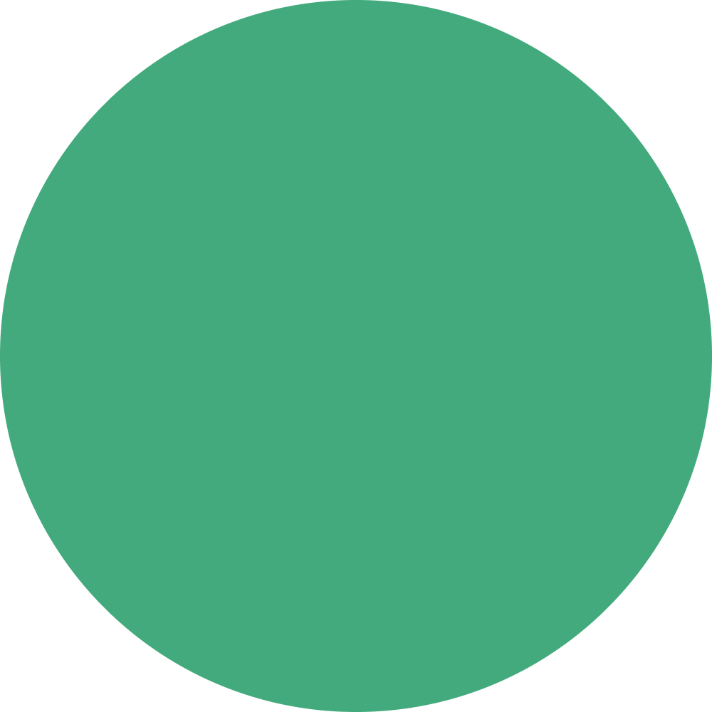 A large, solid green circle on a black background.