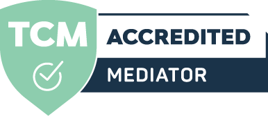 Certification badge with TCM Accredited Mediator label, featuring a green shield with white checkmark and dark blue ribbon