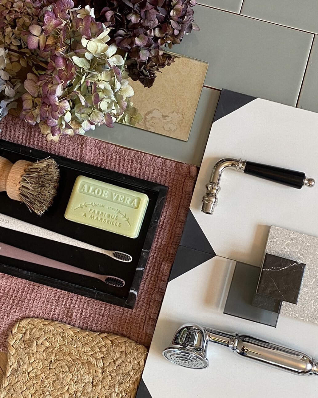 🛁 Bathrooms can be cosy too! Classic floor tiles, traditional nickel accessories and a sage green and mauve colour palette work harmoniously with this period property in &Aring;karp. Natural textures and antiqued mirror add warmth to this scheme. #b