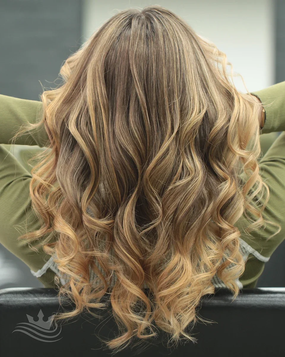 Long hair balayage styling at Crown Hair Studio