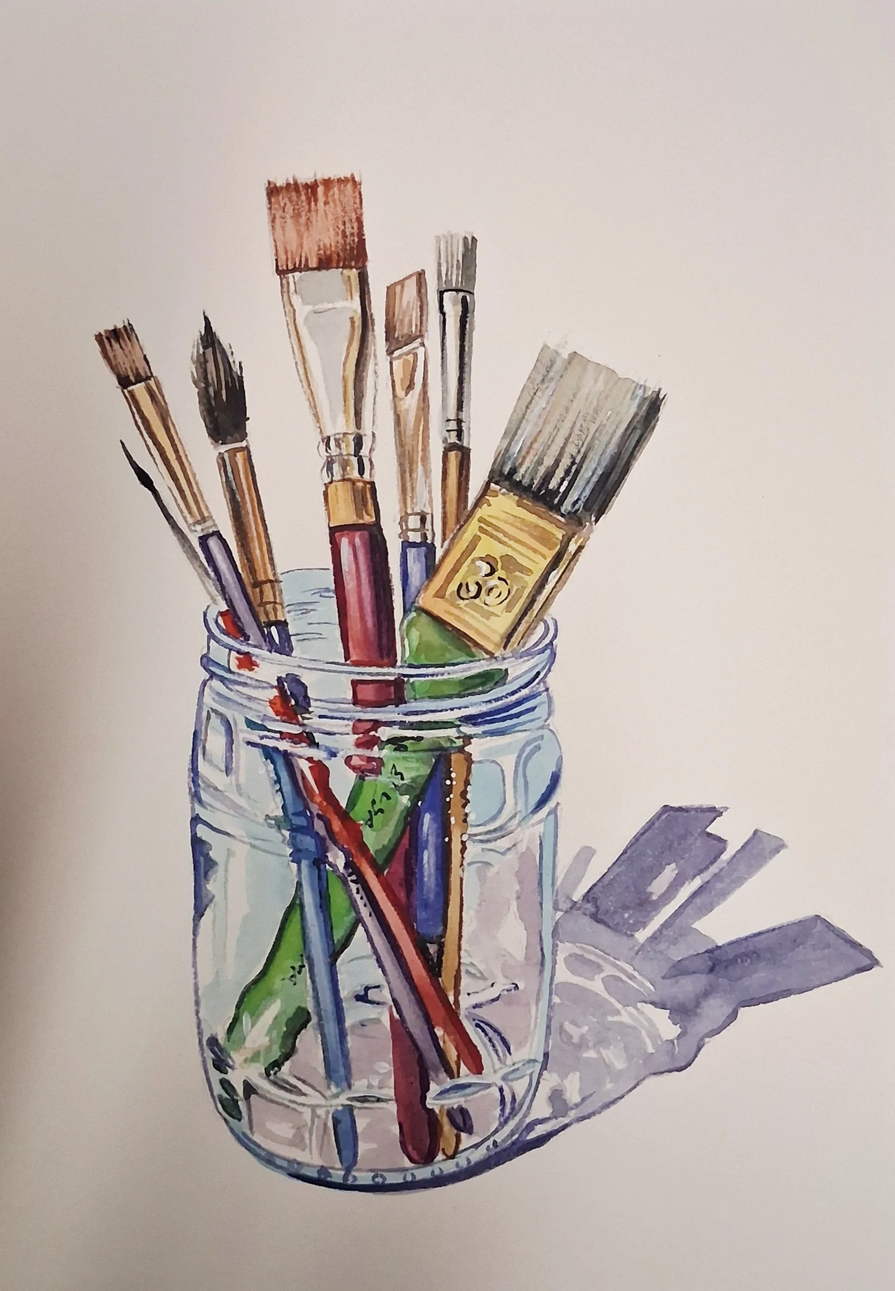 Barattolo di vetro con pennelli