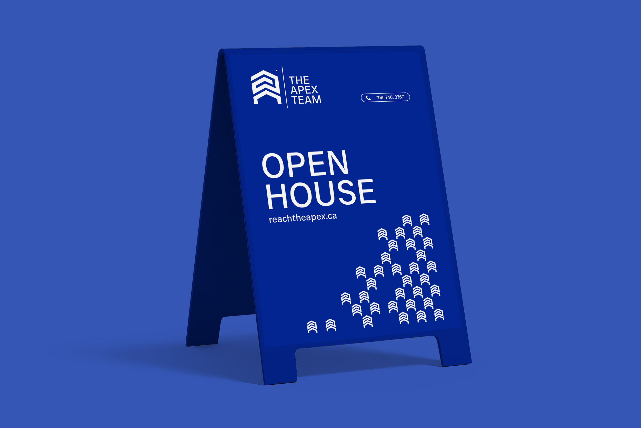 The Apex Team branded open house A-frame sign in electric blue with white logo and "Open House" text — real estate signage designed by So Very Madly.