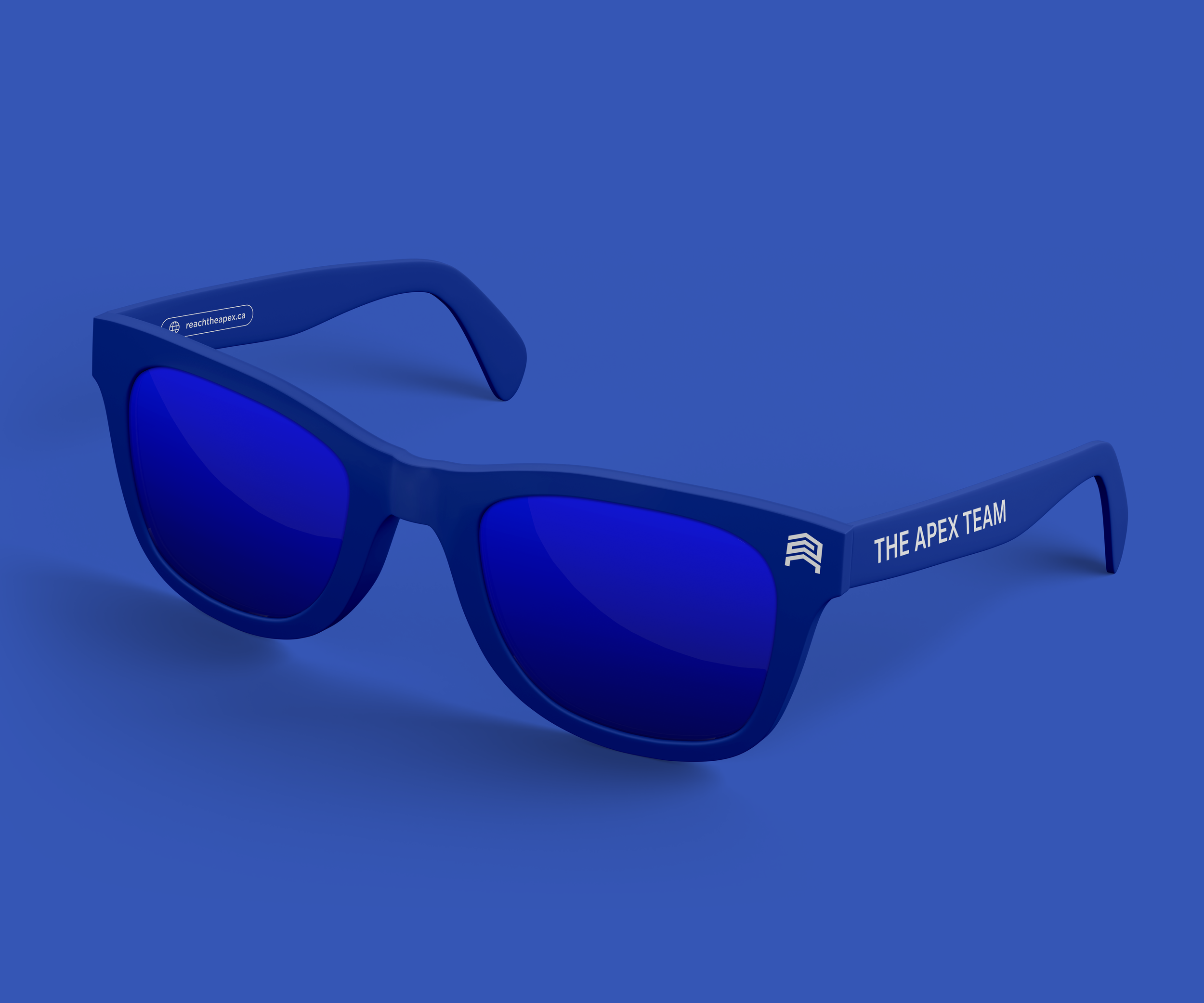 Electric blue Apex Team sunglasses with wordmark and repeating brand pattern in white — branded real estate promotional merchandise.