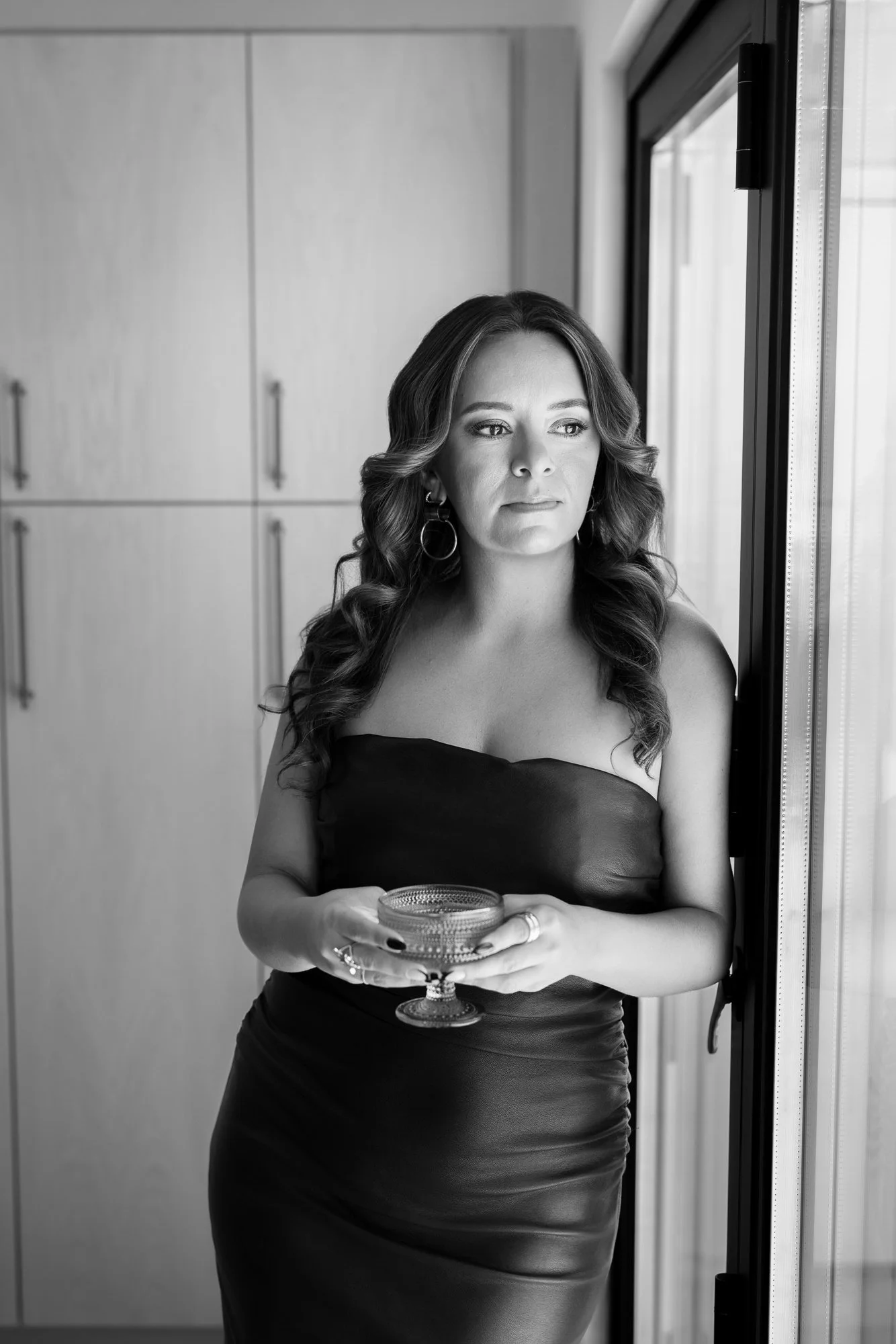 Jazmin Cornejo founder of Bizz Bitch Community posing for a black and white portrait, showcasing confidence, personal branding, and entrepreneurial leadership.