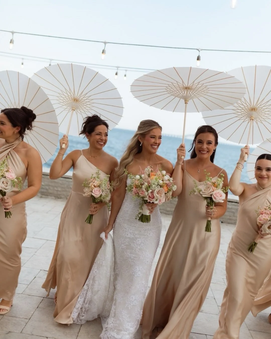 A soft sunset palette, airy summer blooms, and waterfront romance defined Lindsay &amp; Daniel&rsquo;s Piermont wedding aesthetic.🌅
⠀⠀⠀⠀⠀⠀⠀⠀⠀
See more from their big day on our featured weddings blog - website link in bio!

Bride: @lindsay_judge 
Ve