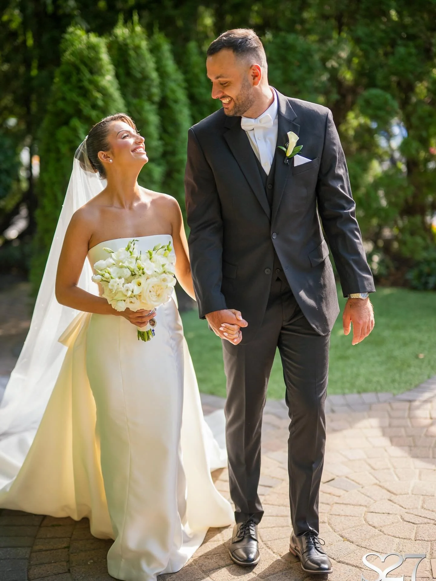 Every detail was considered for Taryn &amp; Daniel&rsquo;s wedding day. From Taryn&rsquo;s bouquet of Mini Calla Lilies, White Roses, Freesia, and Lisianthus to monotype bridesmaid florals and glowing candlelight, this Fox Hollow celebration felt tim