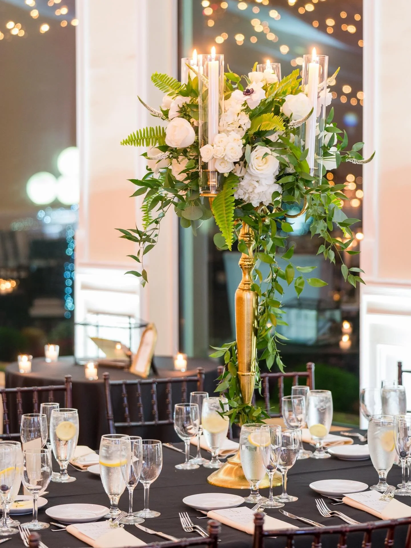 Part 2 of Madison &amp; Parker&rsquo;s October wedding day at Land&rsquo;s End Catering 🤍🕯️

Lush greenery, glowing candlelight, and refined reception details set the tone for a romantic evening. Candle-focused centerpieces added warmth and depth, 