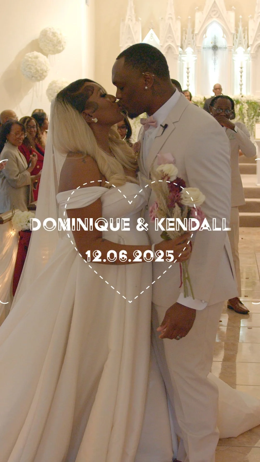 A bride and groom kissing during their wedding ceremony in a church, with guests in the background. The bride is holding a bouquet, and the image has the text "DOMINIQUE & KENDALL 12.06.2025" inside a heart outline.