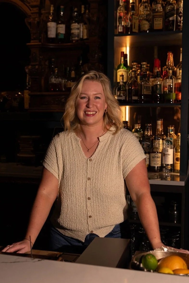 Rachel Smalling, owner of 1854 Cocktail Bar & Lounge, providing hospitality-driven service behind the bar in Cookeville.