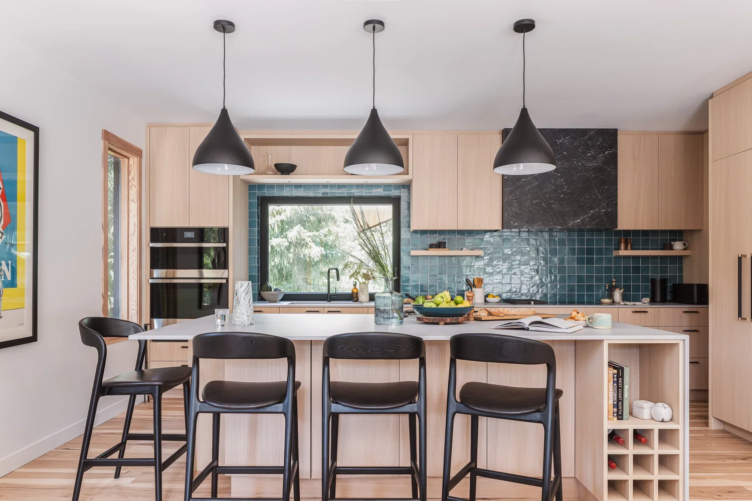 Tapleys Living room with teal/turquoise color accents — full renovation interior design in Whistler, BC by LRD Studio. Photography by Matt Anthony.