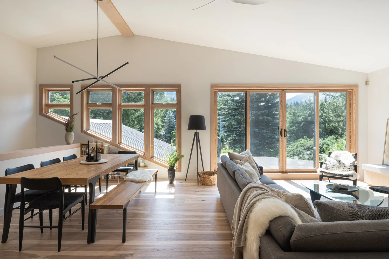 Tapleys Kitchen island with waterfall countertop, wine pocket and cookbook pocket at side — full renovation interior design in Whistler, BC by LRD Studio. Photography by Matt Anthony.