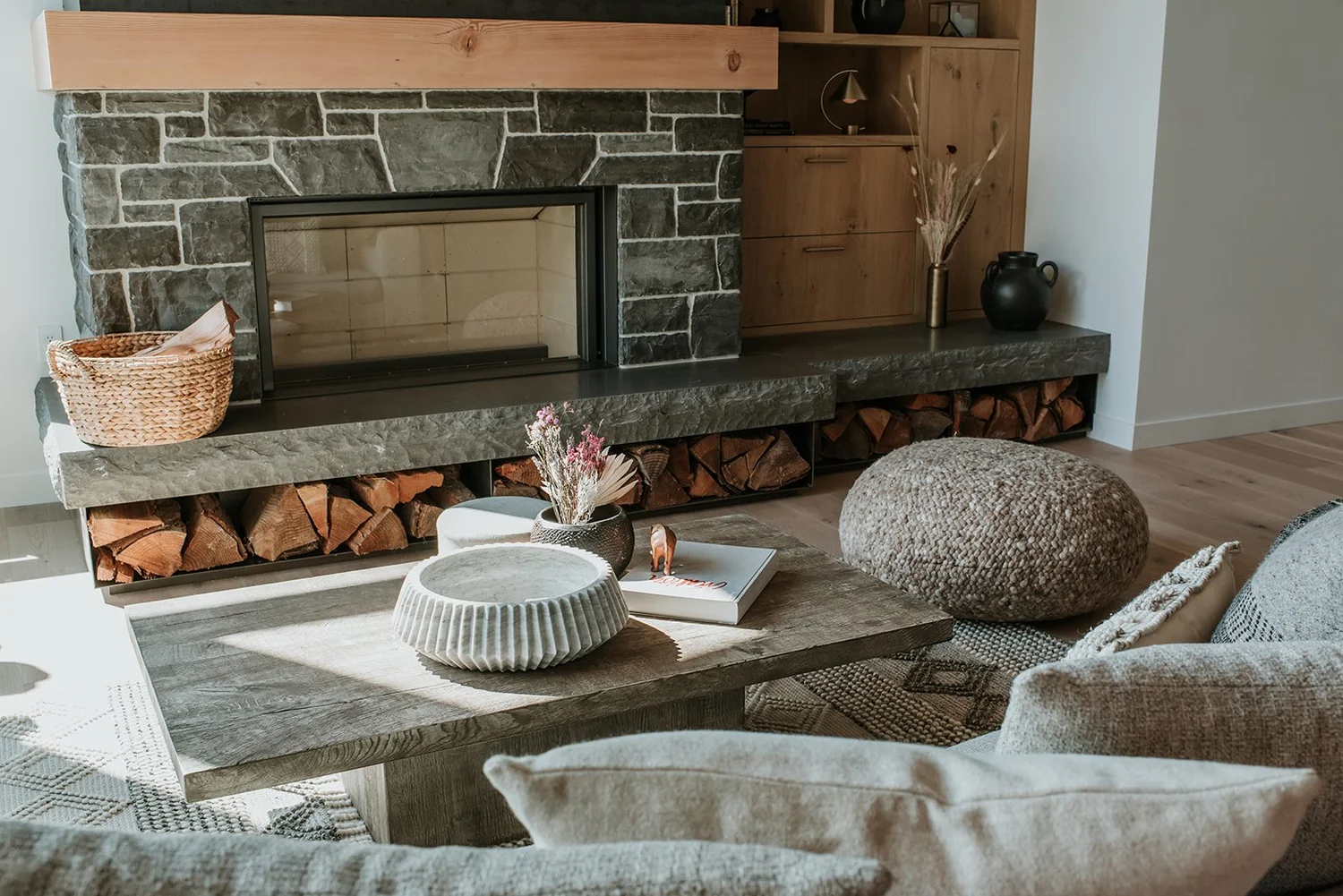 Balsam Full living room: Kingston slate fireplace, vaulted cedar ceiling, oak built-ins — new-build interior design in Whistler, BC by LRD Studio. Photography by Darby Magill.