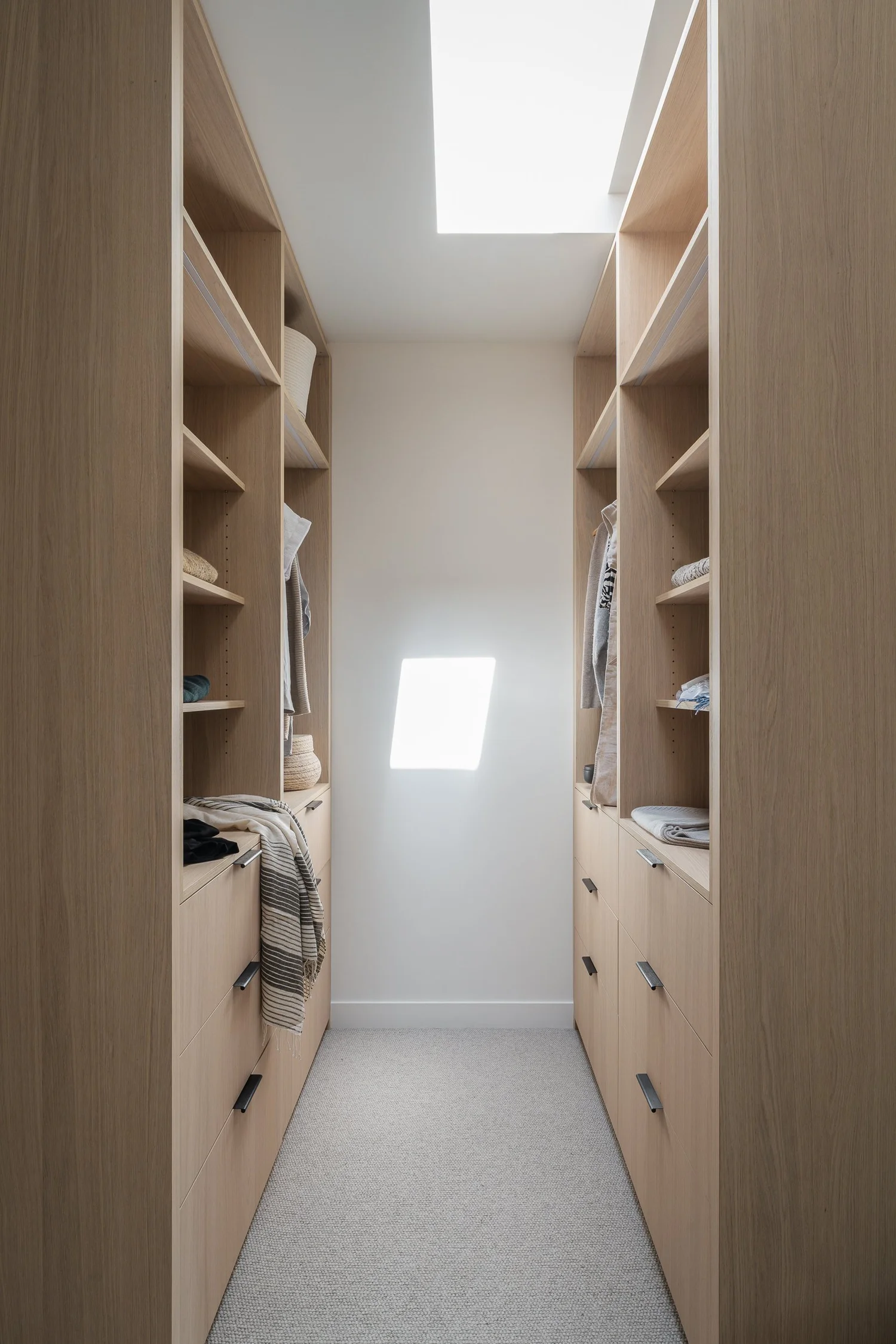 Tapleys Underlit vanity with black Carmana stone — full renovation interior design in Whistler, BC by LRD Studio. Photography by Matt Anthony.