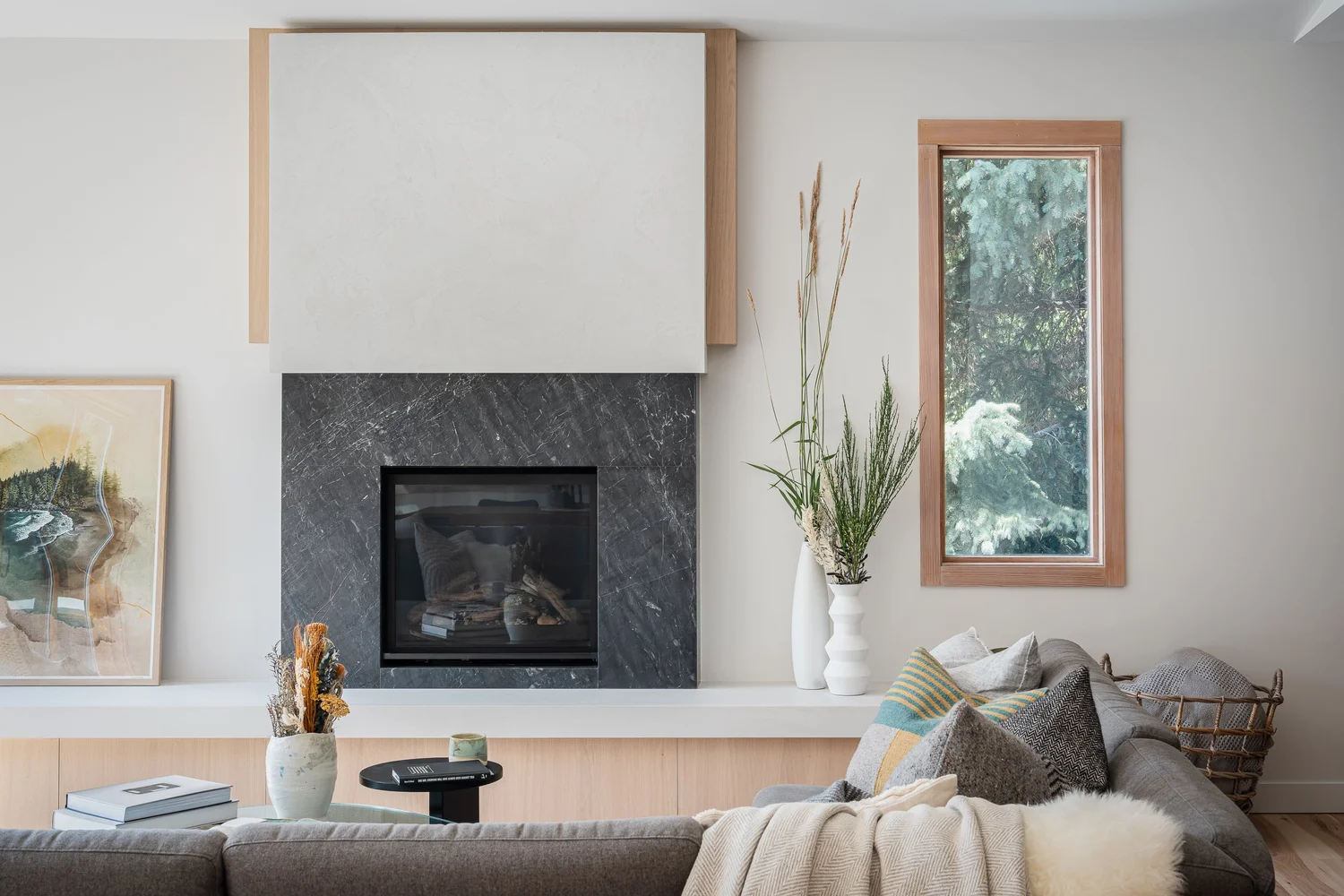 Tapleys Island end detail showing wine pocket and cookbook pocket at waterfall edge — full renovation interior design in Whistler, BC by LRD Studio. Photography by Matt Anthony.