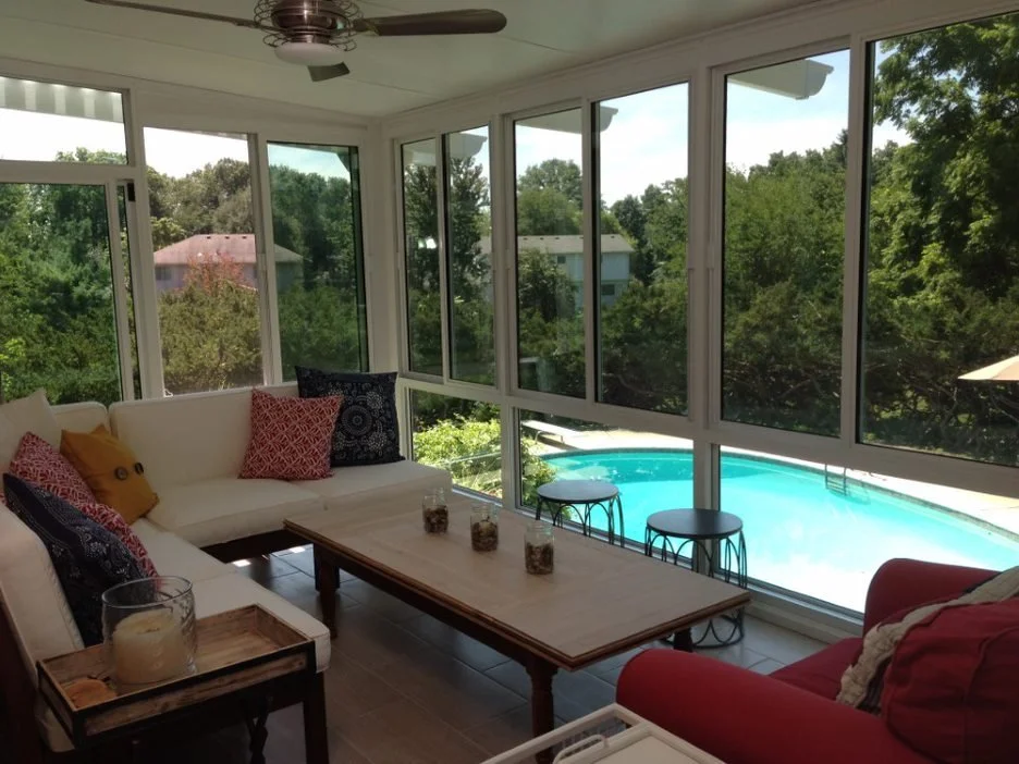 sunroom overlooking pool.jpg