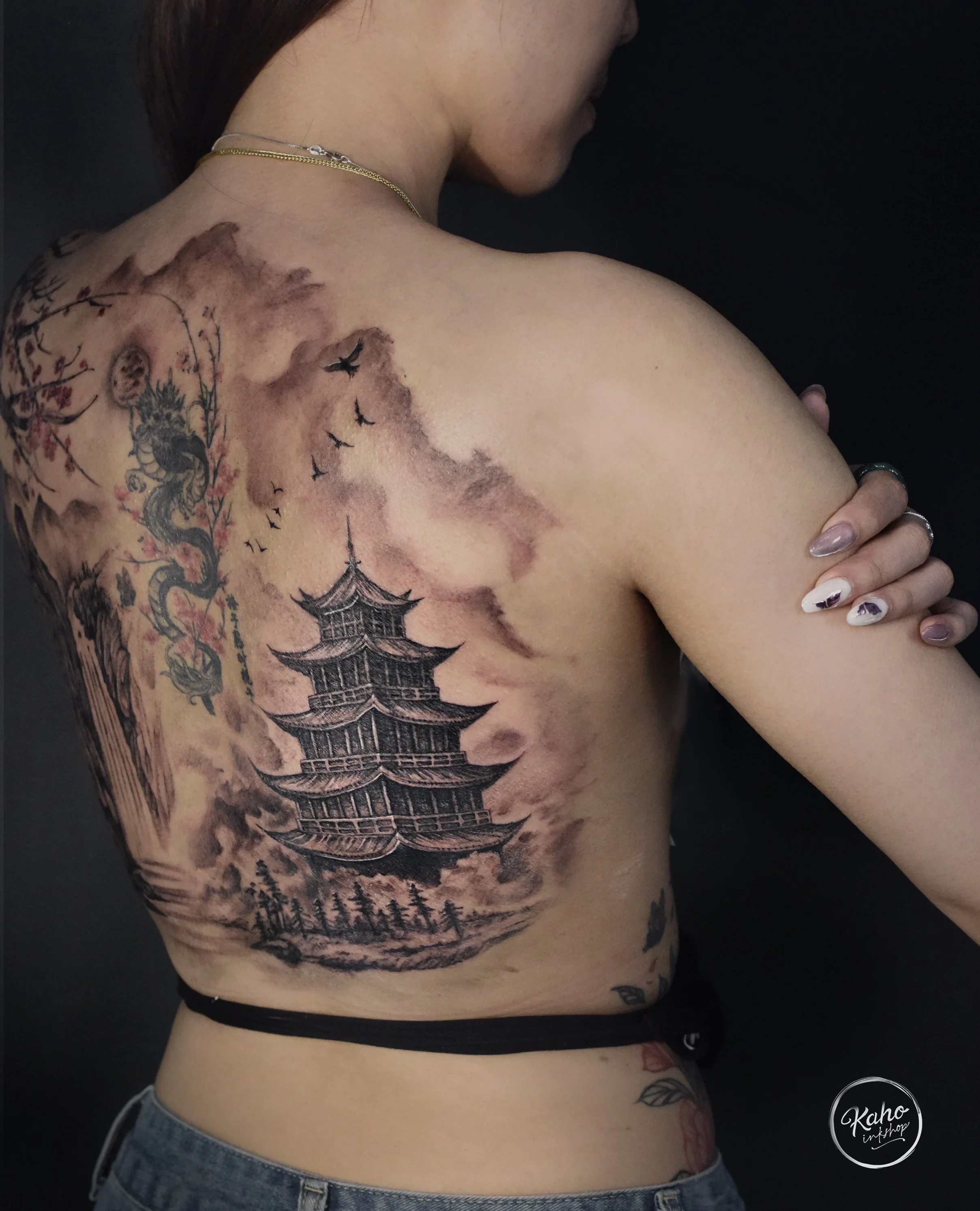 Chinese ink watercolor landscape tattoo with temple building. Created by kaho Inkshop, based in Los angeles. also providing services in san francisco, san diego and new york