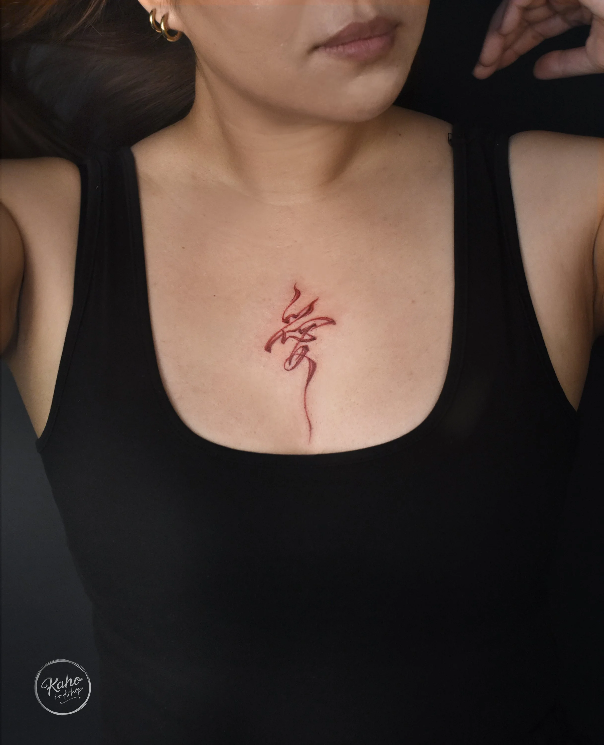 KaHo inkshop- Red Calligraphy tattoo: kanji tattoo, asian tattoo brushstrokes tattoo , los angeles