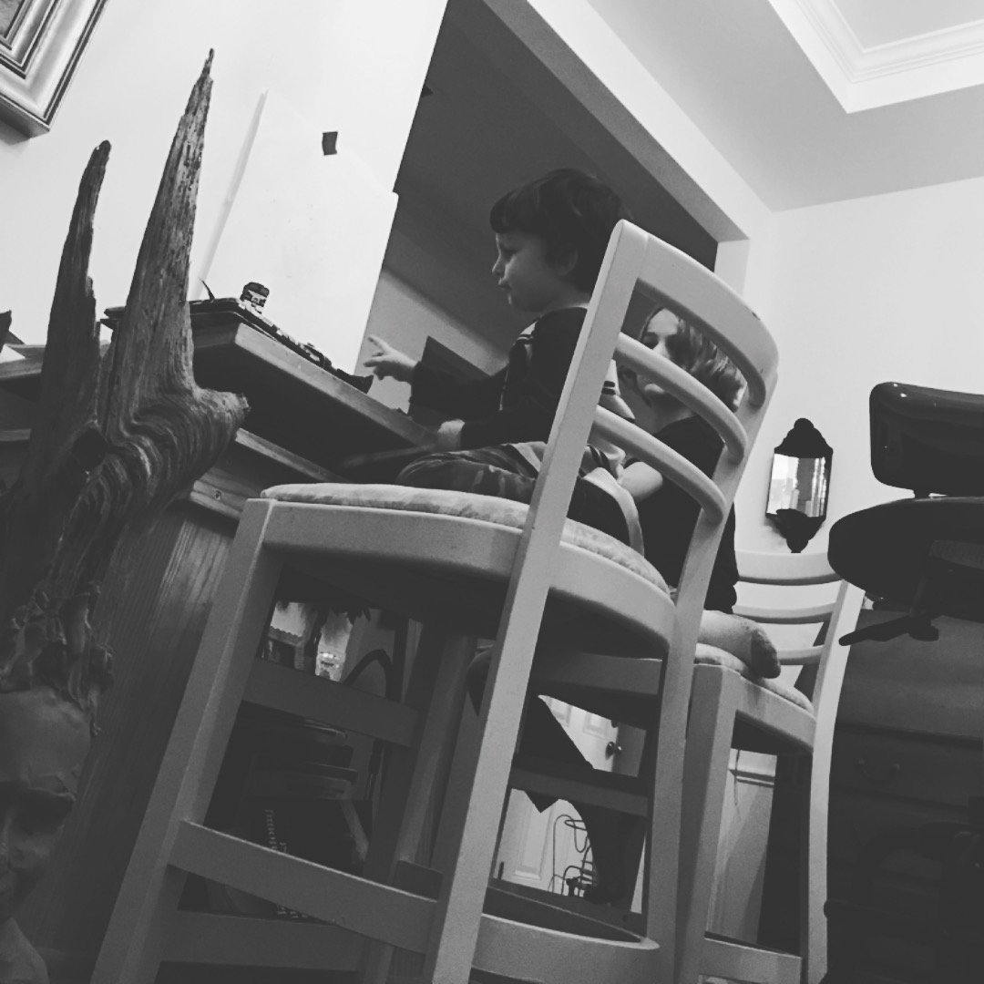 having kids means sharing your workspace and sometimes that means sculpting on the floor while they battle with transformers on your sculpture table