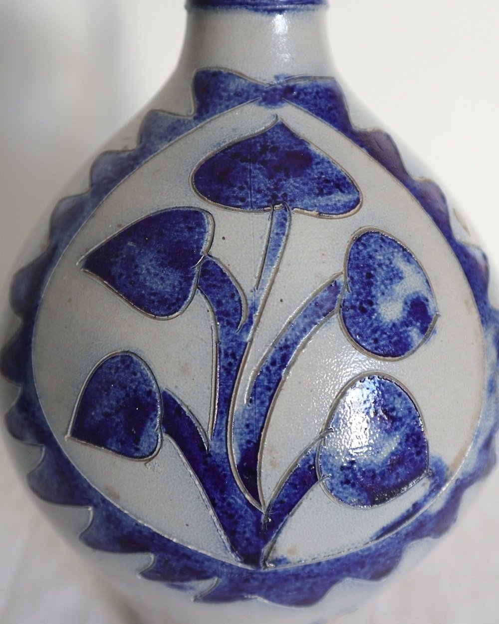 Large vintage German Westerwald salt glazed stoneware flagon with cobalt blue foliage decoration and two bands to the neck.