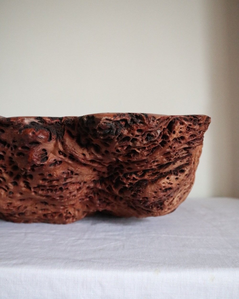 Large Australian hand carved red gum burl wood centrepiece bowl with polished centre and organic naturalistic outside. Signed 'M Bailey' and original Merv Bailey sticker to base.