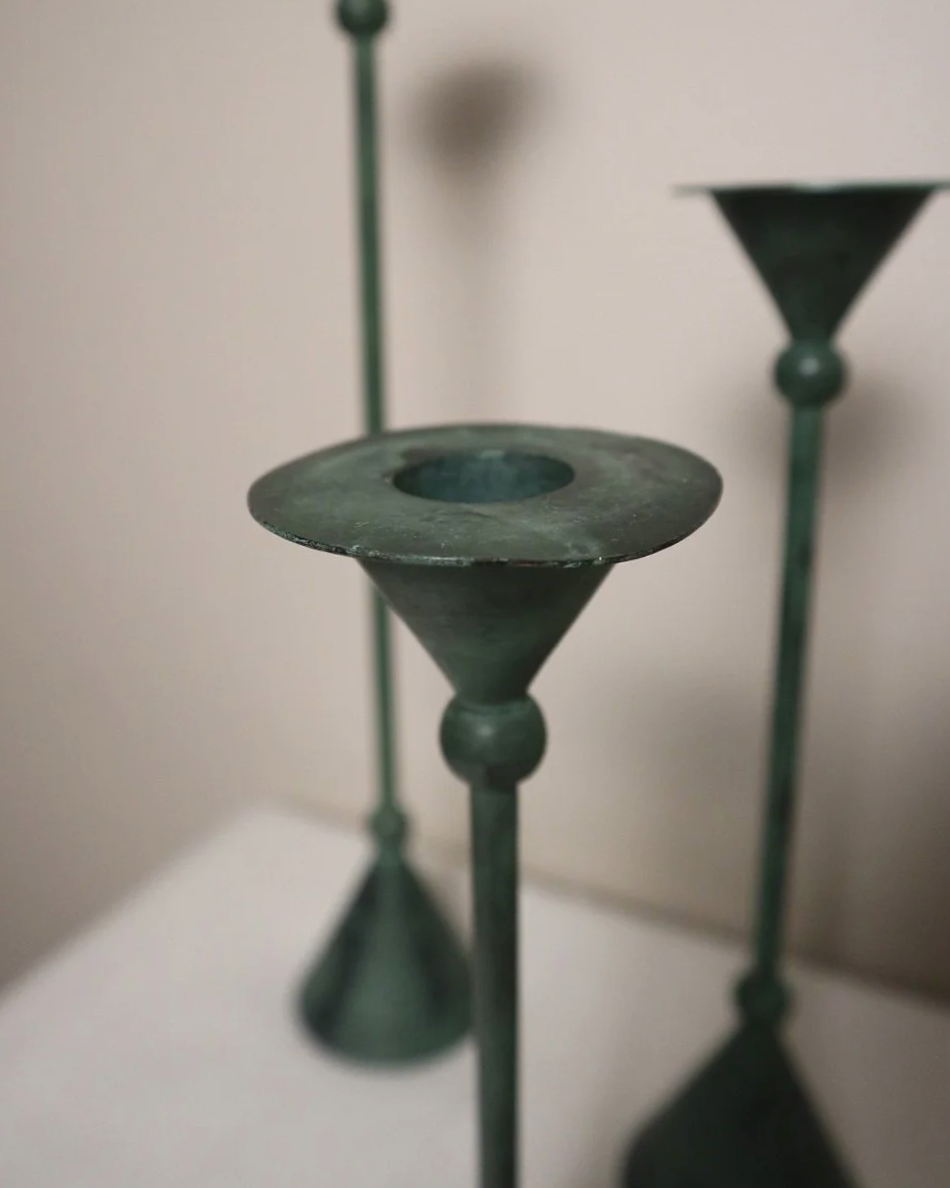 Set of 4 Postmodern verdigris metal candleholders, circa 1980s. In the Memphis style of Christian de Beaumont.
