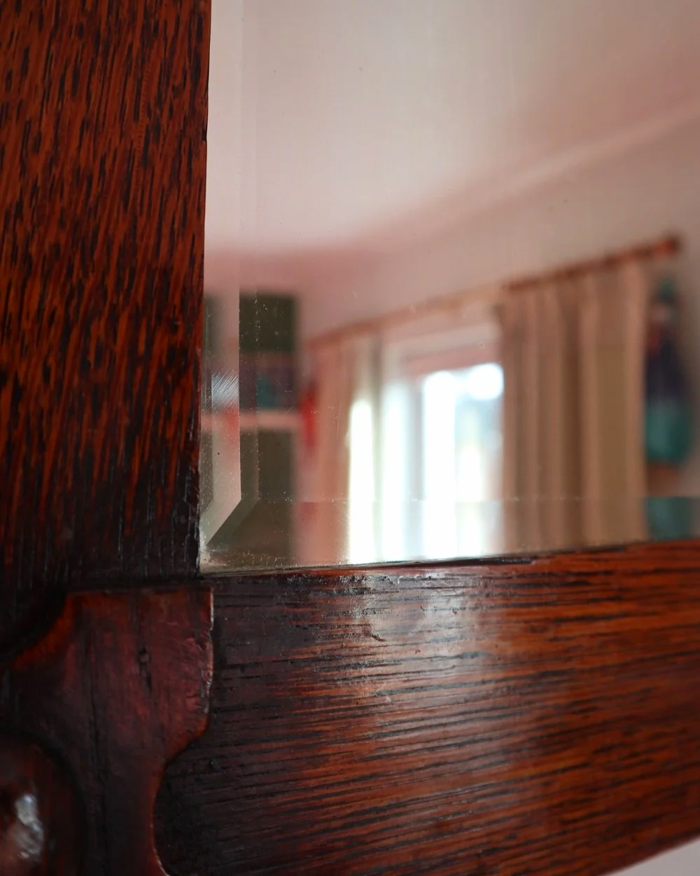 Arts & Crafts square wooden framed mirror with carved corner detailing. Circa 1930s.