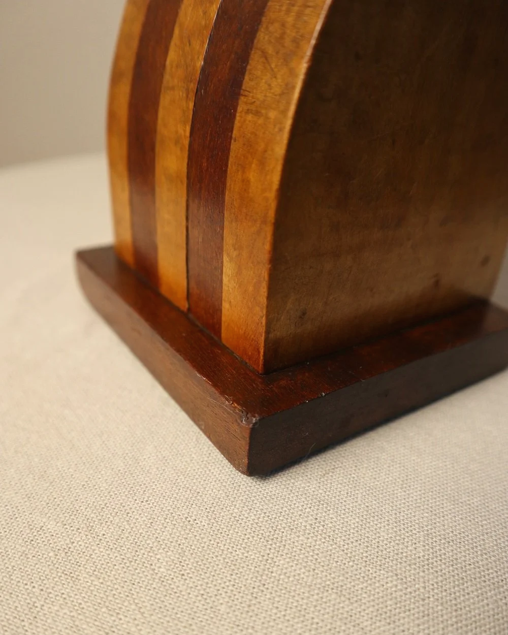 Vintage Art Deco style two tone arched wooden bookends.