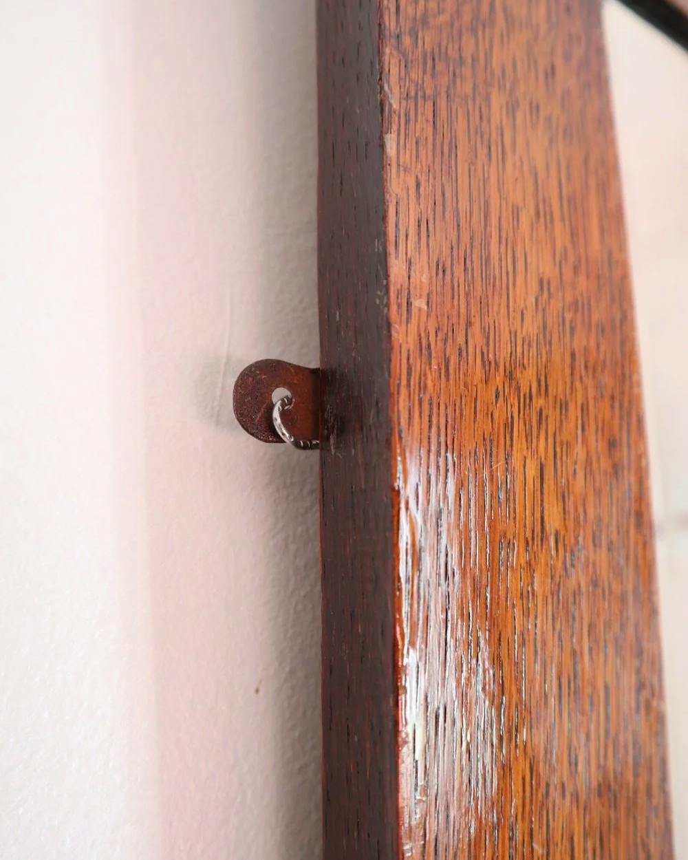 Arts & Crafts square wooden framed mirror with carved corner detailing. Circa 1930s.