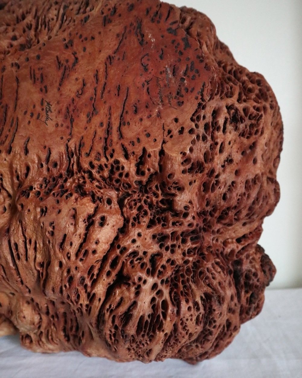 Large Australian hand carved red gum burl wood centrepiece bowl with polished centre and organic naturalistic outside. Signed 'M Bailey' and original Merv Bailey sticker to base.