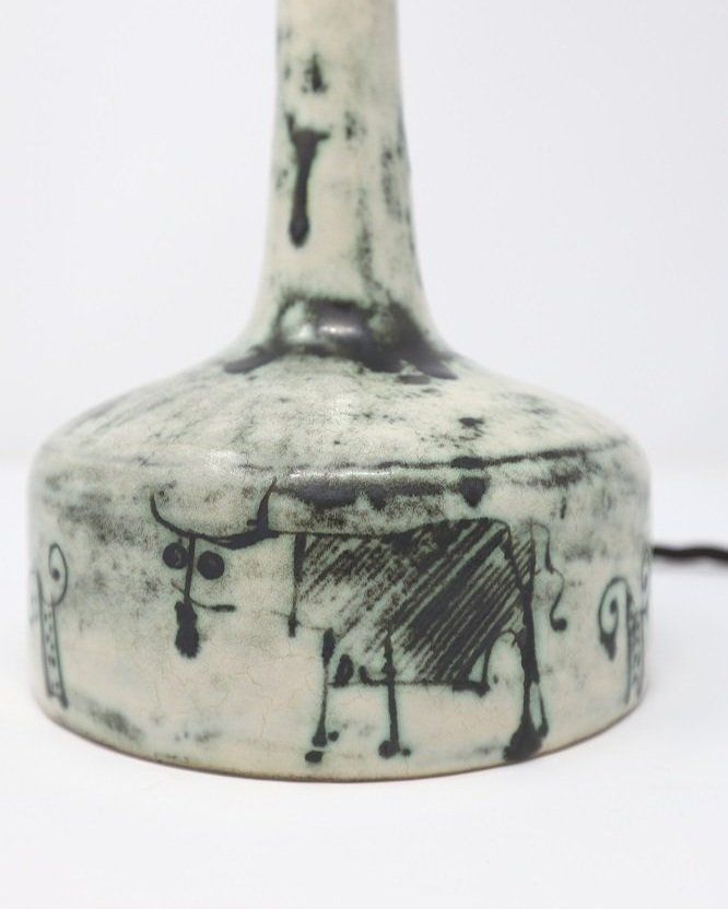 Beautiful and rare small, midcentury pale blue / grey ceramic table lamp by French ceramicist, Jacques Blin. Hand engraved with illustrations of bulls (taurus) and signed to base. Circa 1950-60s.