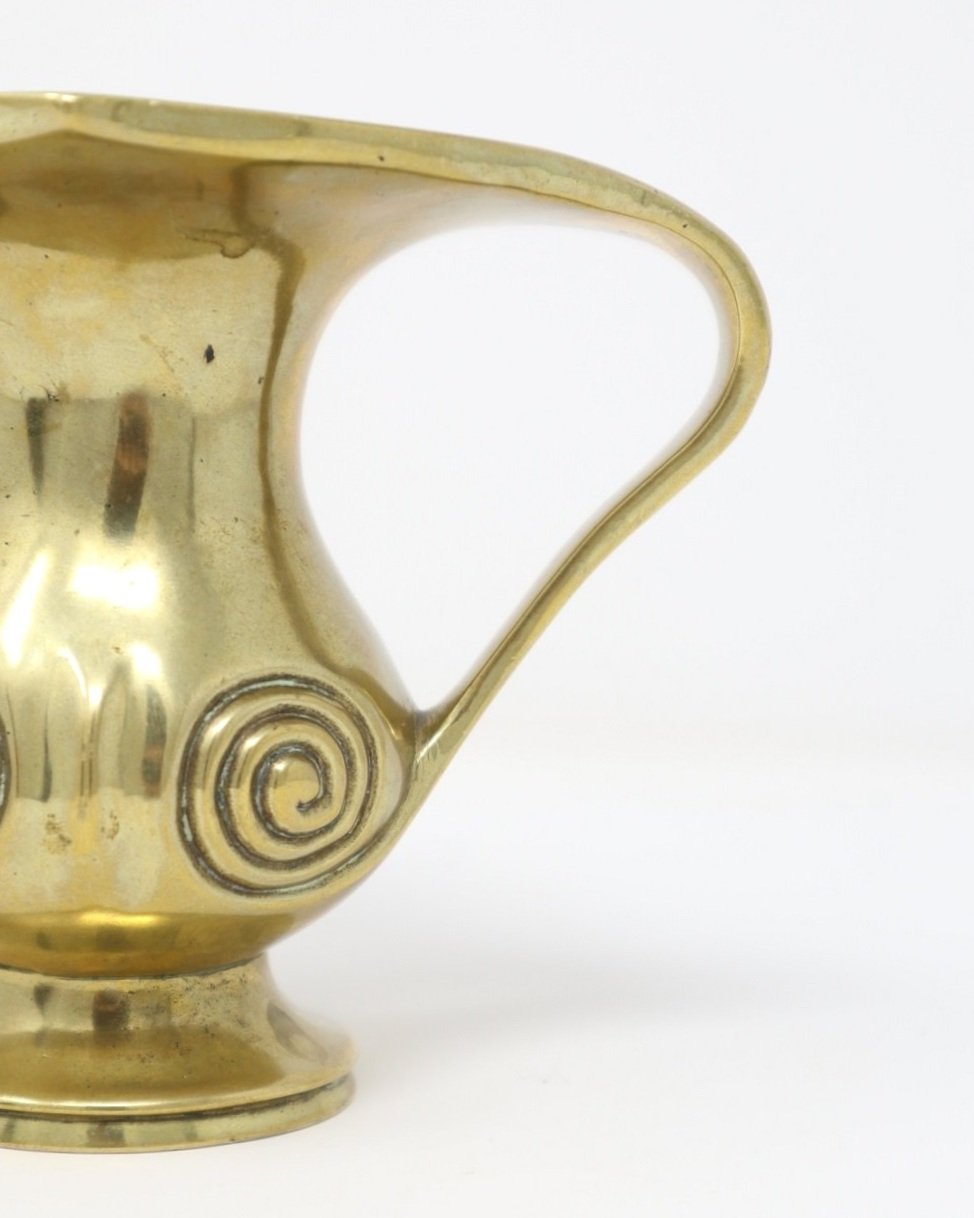 Heavy 19th / 20th Century Japanese cast twin handled brass vase of Mimikuchi form decorated with spiral detail to front and back