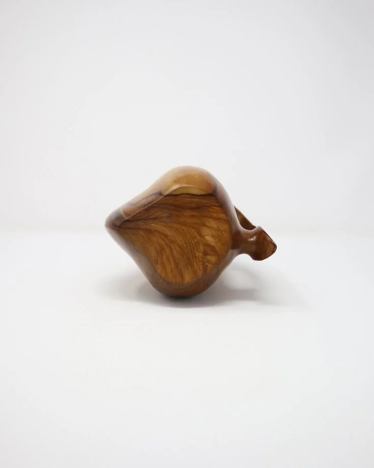 Small carved olivewood monoxyl pitcher