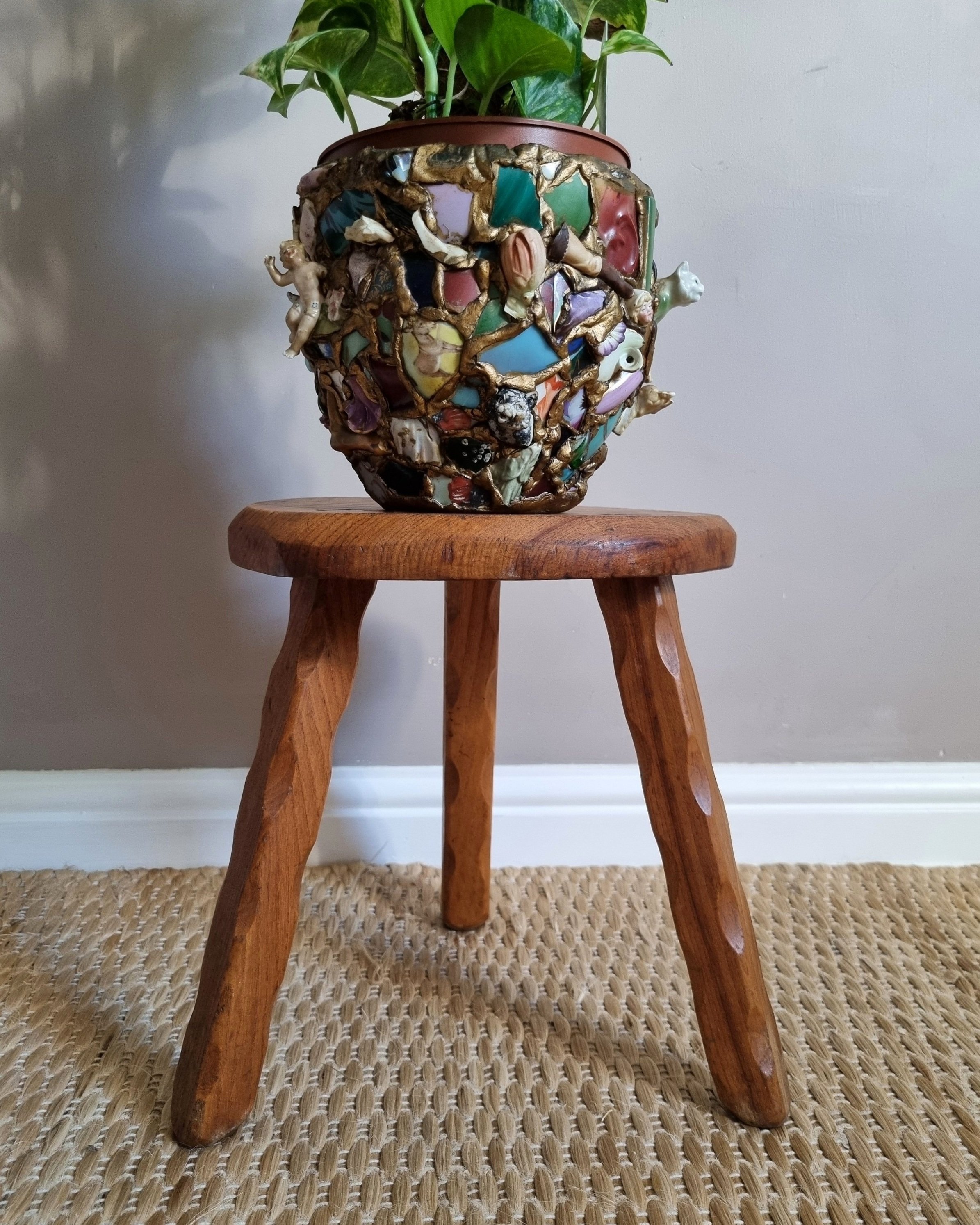Vintage rustic handmade warm wooden tripod stool with carved legs. Stamped 'John Chapman Woodcrafts Northwood'.