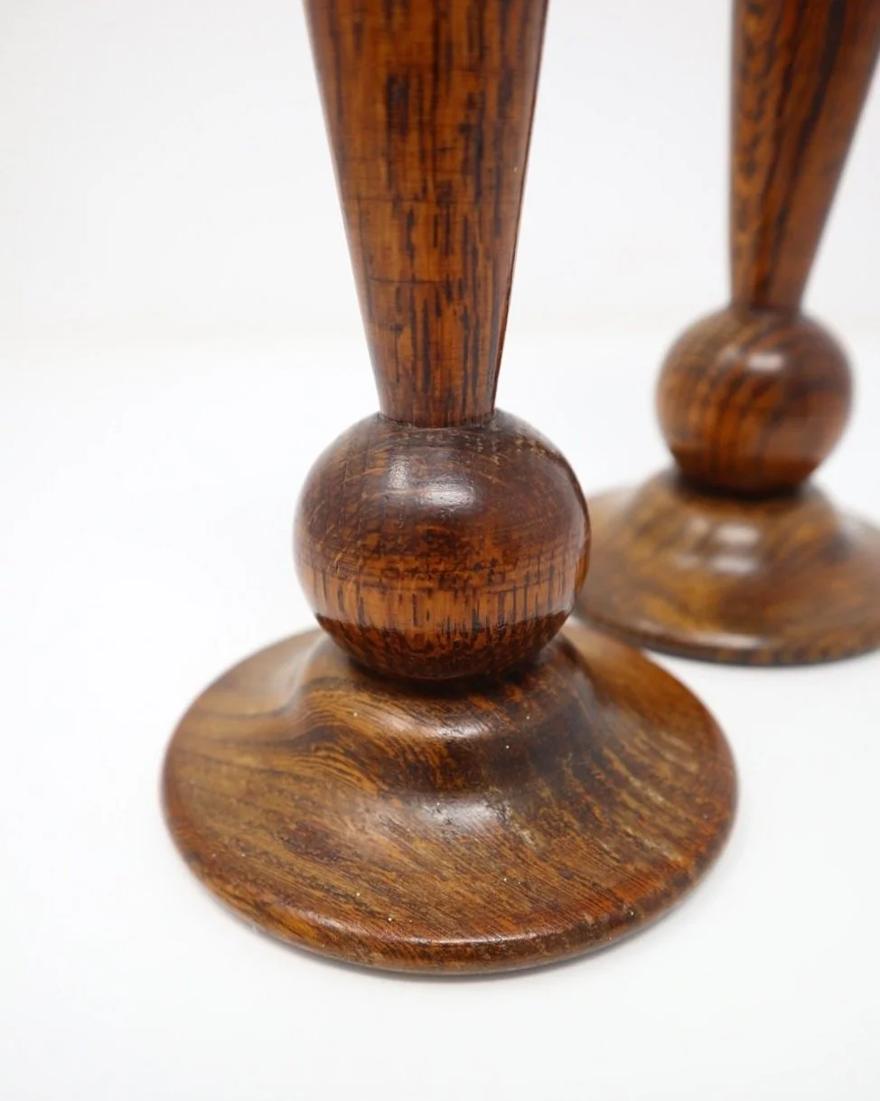 Pair of sculptural Art Deco solid oak carved wooden candlesticks
