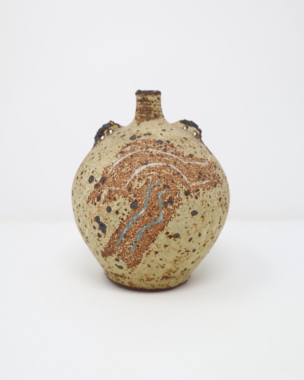 Studio pottery handmade spherical speckled vase. Rustic, textured crackled ceramic. Signed to base 'E' likely the work of Elizabeth Saunders, UK.