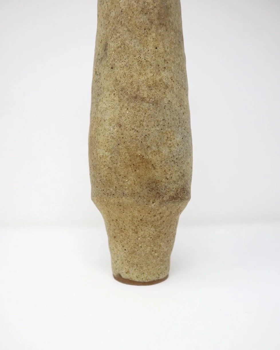 Set of two mid century heavy handmade textured sandstone vessels with thick, speckled drip glaze. Both marked 'MR' to base, likely Mike Reynolds, UK. Circa 1970s.