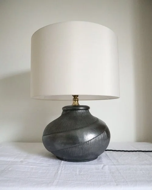 Spanish mid century metallic black ceramic round table lamp from Casa Fina - Valencia, Spain. With spiral and ribbed detailing, circa 1970s.