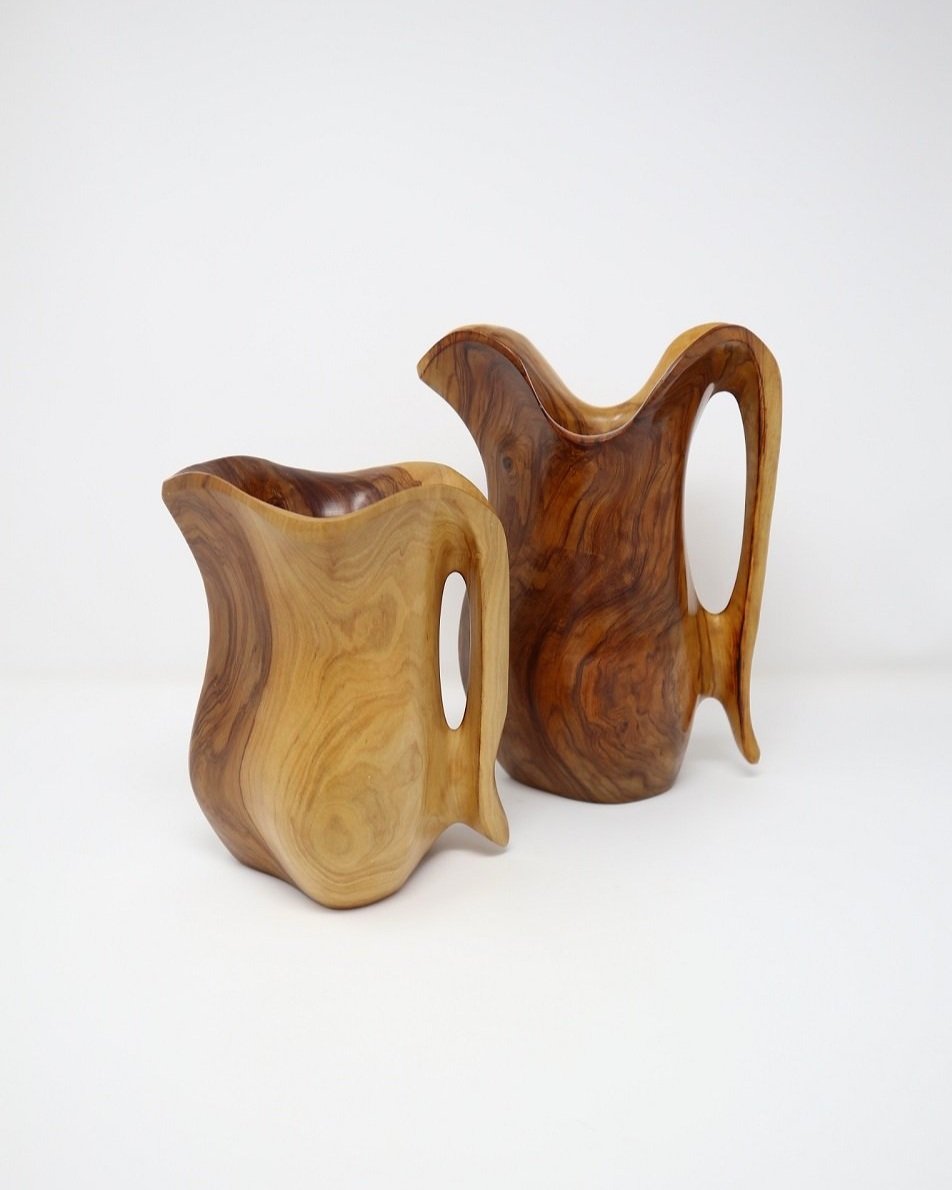 Smooth, small hand carved olivewood monoxyl pitcher, circa 1960s. In the manner of Alexandre Noll. Carved from one piece of solid wood.