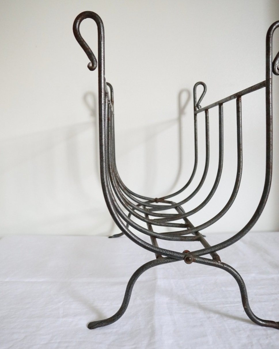 Folding iron magazine / firewood log rack.