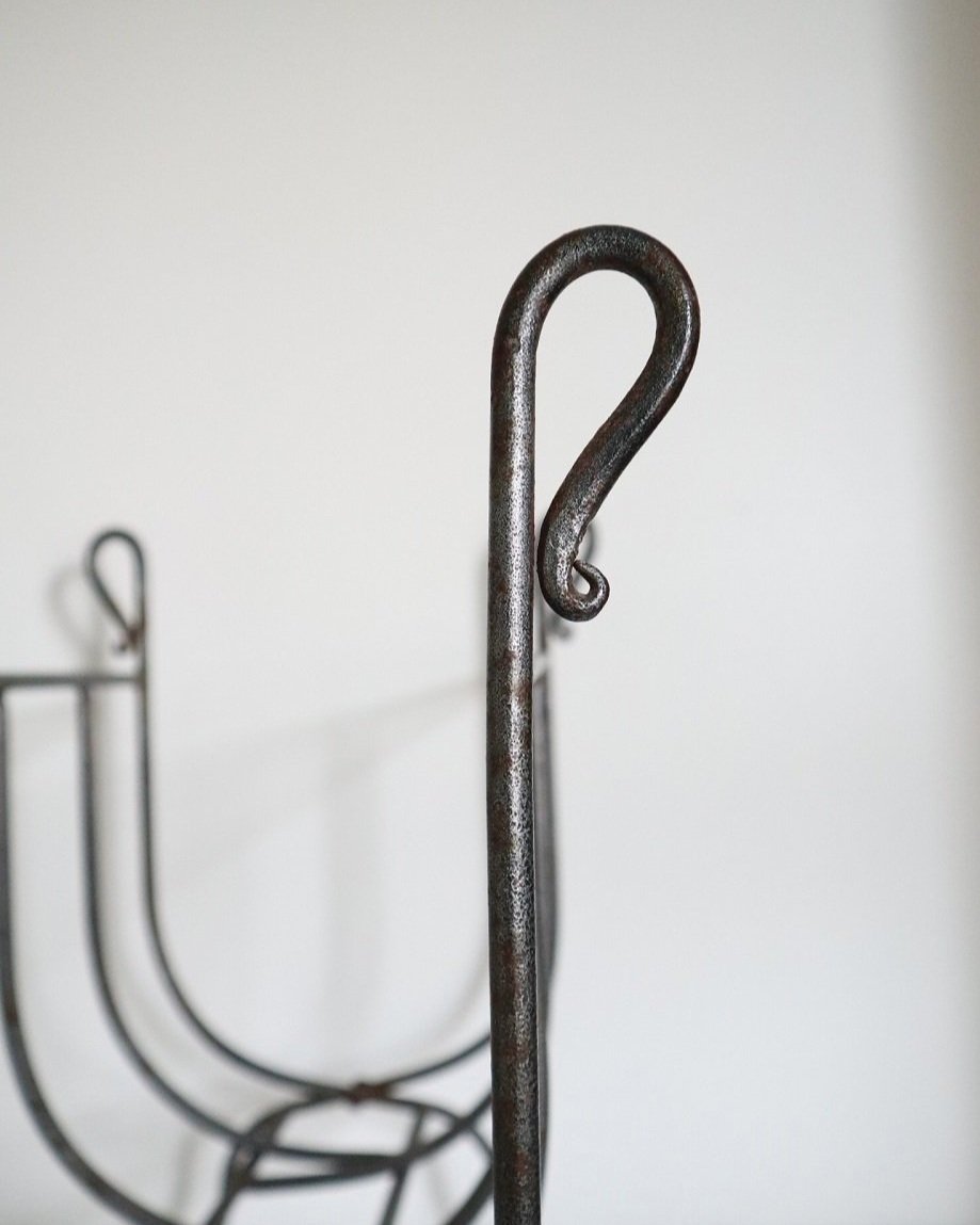 Folding iron magazine / firewood log rack.