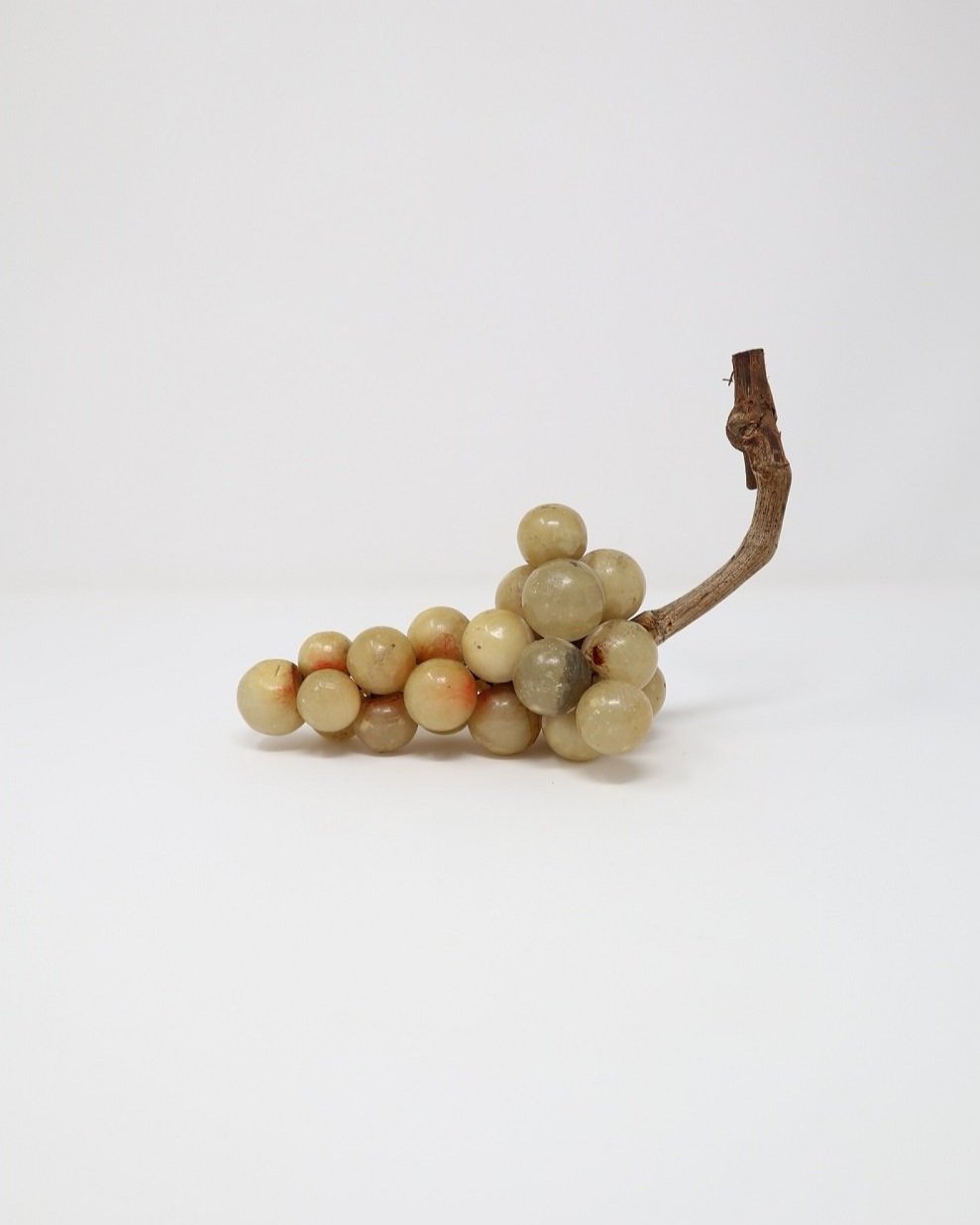 Small 1970s Italian cluster of pale alabaster grapes with real vine stem. Originally bought from Venice in the seventies.
