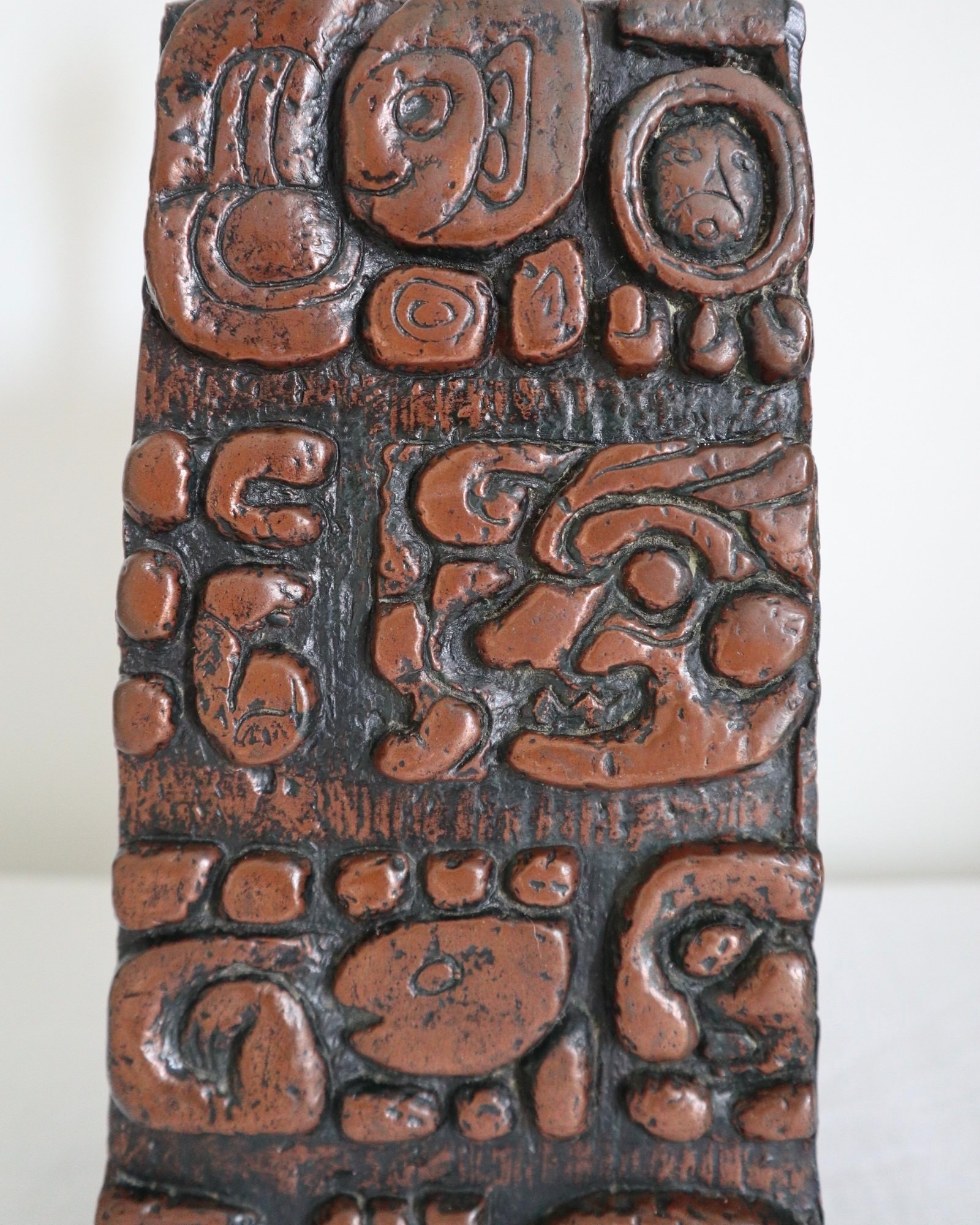 Mid century very heavy Brutalist Aztec style cast resin table lamp with metallic bronze finish.